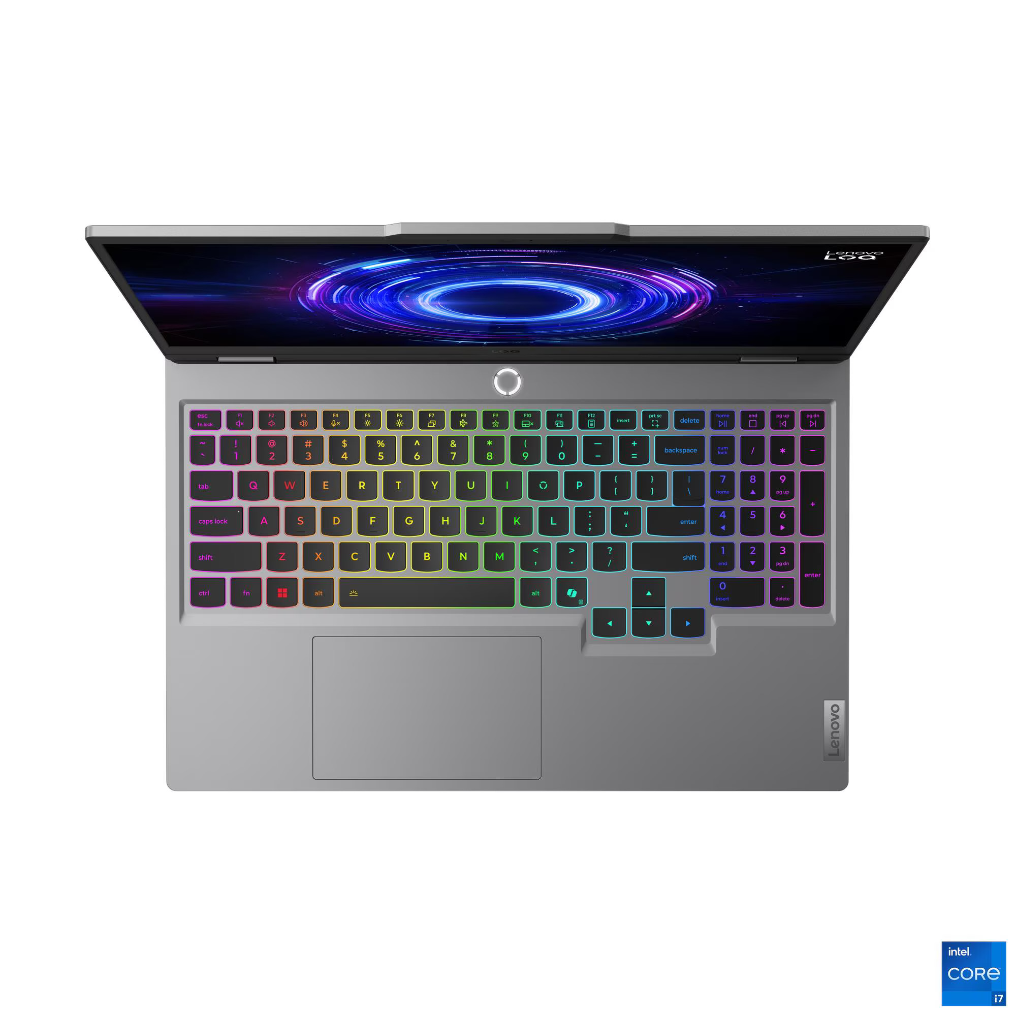 Kıvrımlı duvar kağıdına sahip, açık gri Lenovo dizüstü bilgisayar ve arkadan aydınlatmalı klavye.