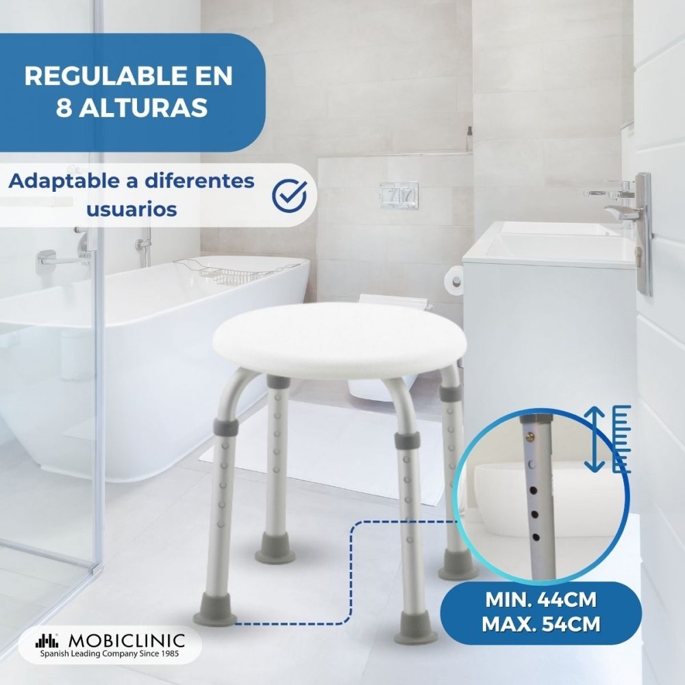 Un taburete blanco regulable en altura con cuatro patas en un baño.