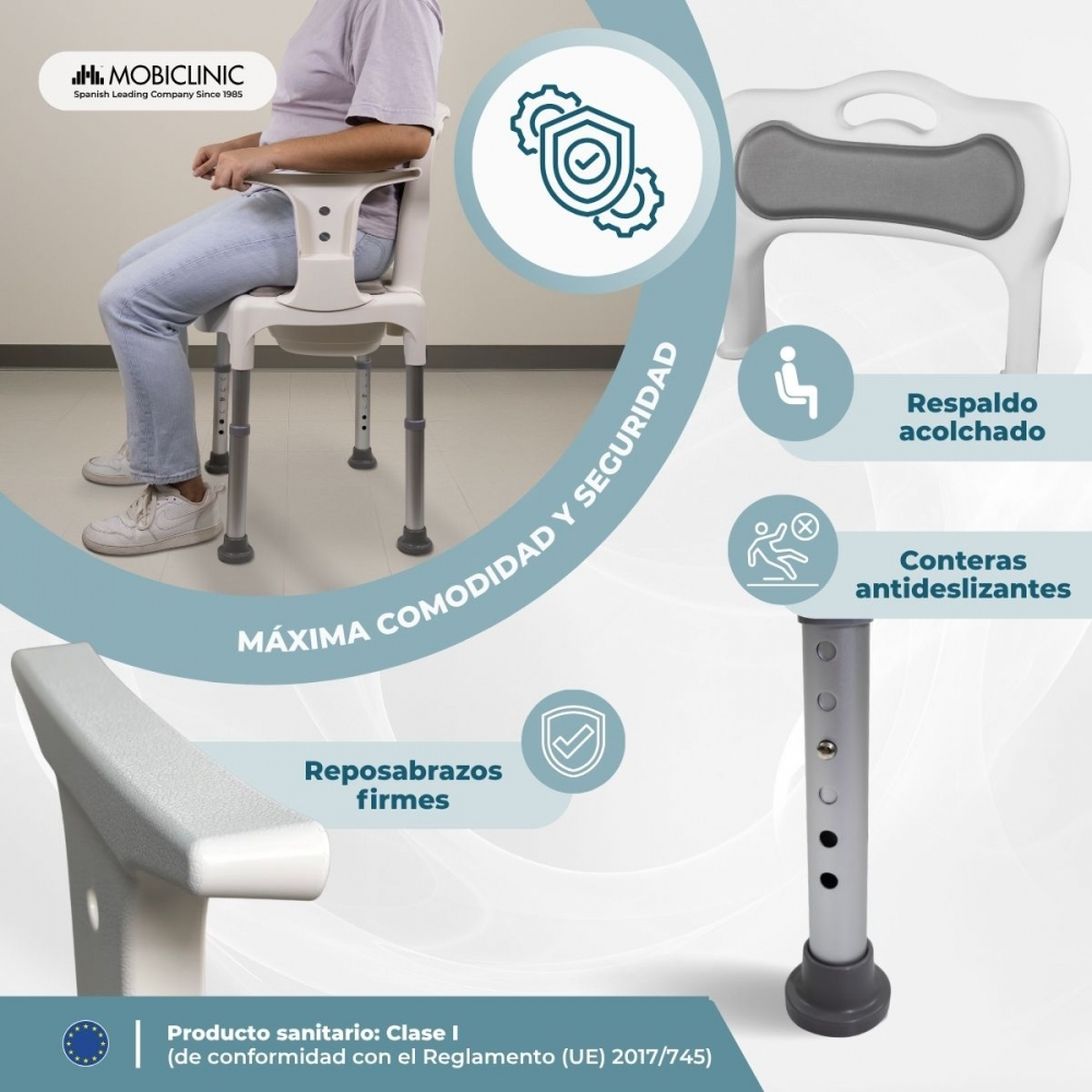 Persona sentada en silla de ducha con respaldo y reposabrazos acolchados.