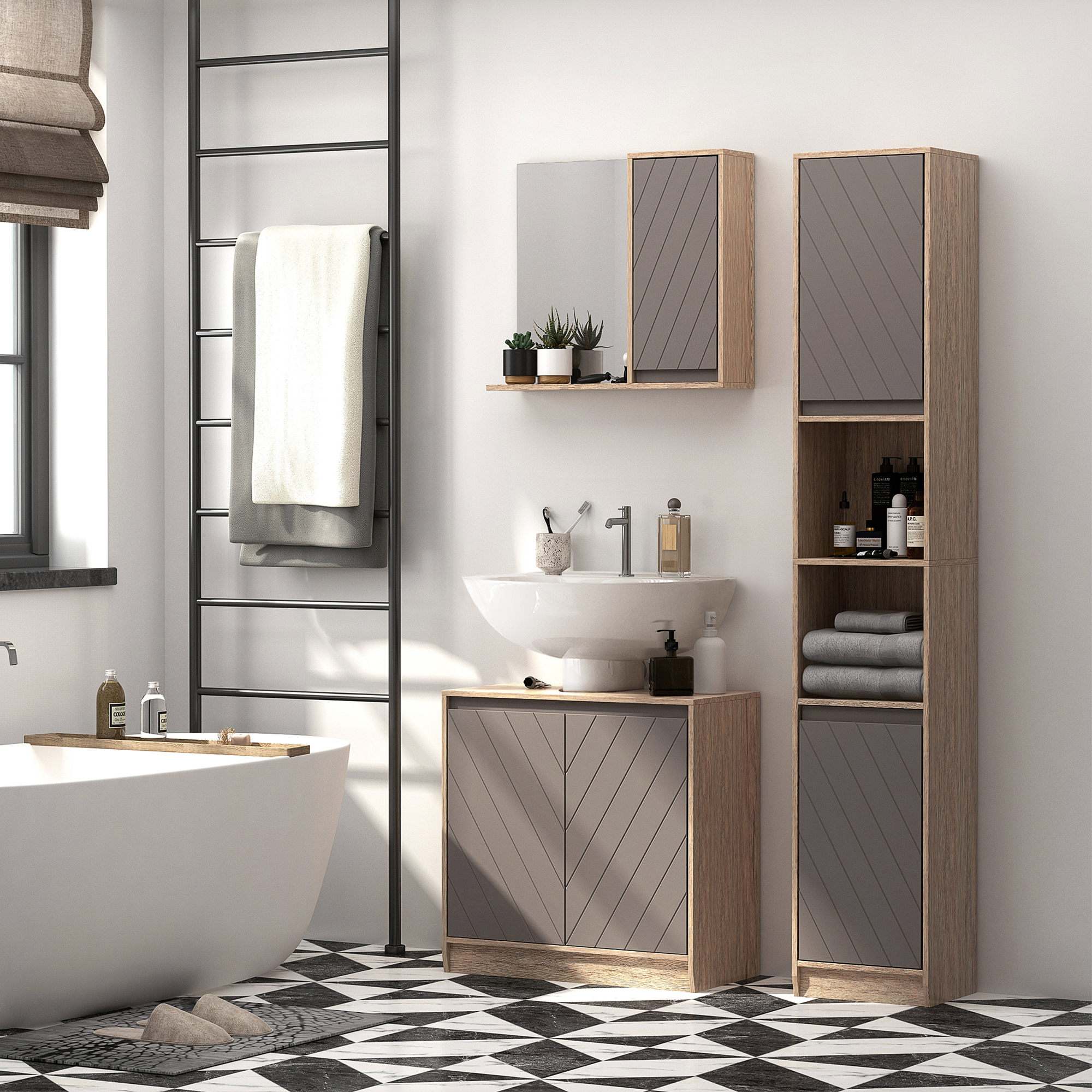Baño moderno con bañera, lavabo, armarios y toallero.