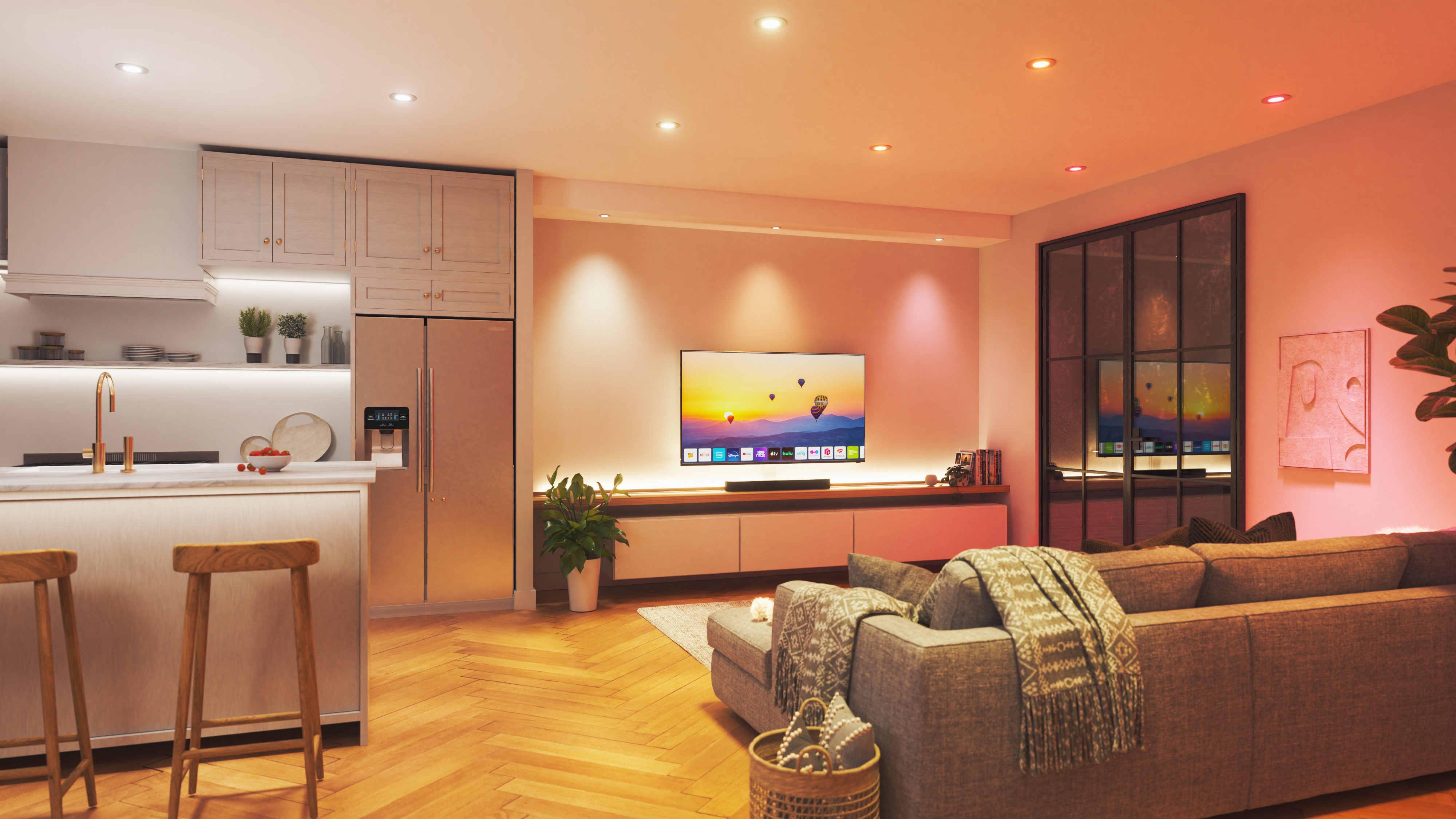 Modernes Wohnzimmer mit Küche, Sofa, Fernseher und Holzboden.