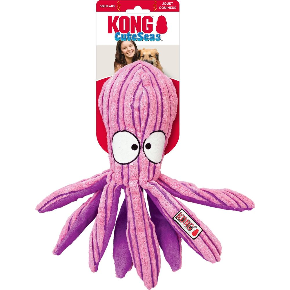 Różowa pluszowa zabawka ośmiornica KONG z dużymi białymi oczami i fioletowymi paskami.