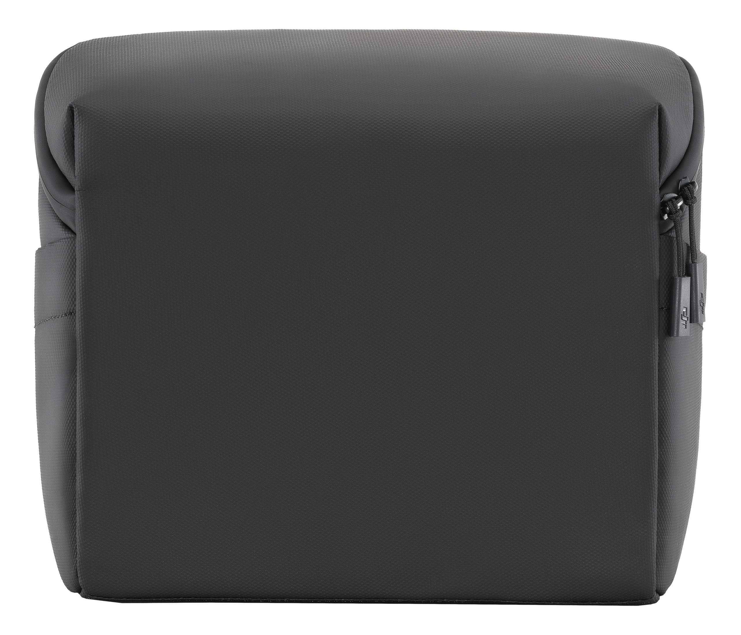 Czarna torba materiałowa z zamkiem i uchwytem.