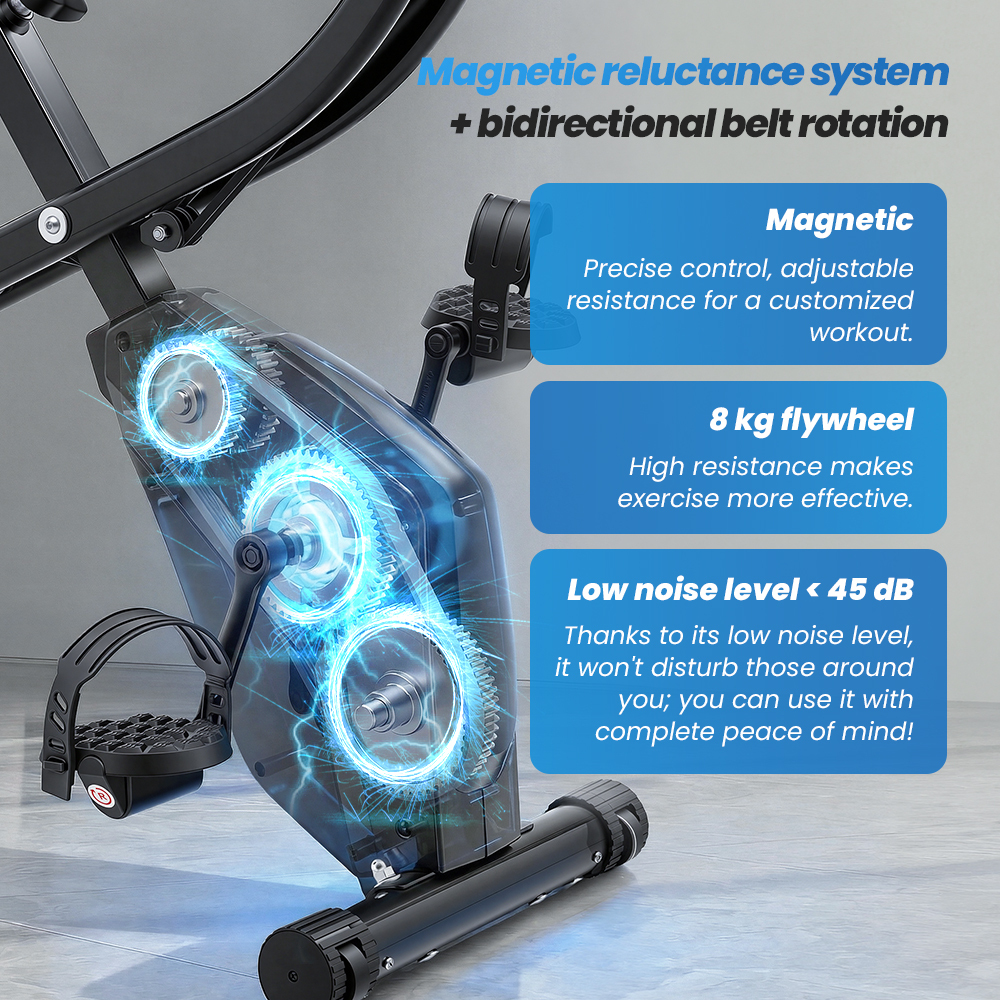 Czarny rower stacjonarny z widocznymi zębatkami i polami tekstowymi o oporze magnetycznym, kole zamachowym i poziomie hałasu.