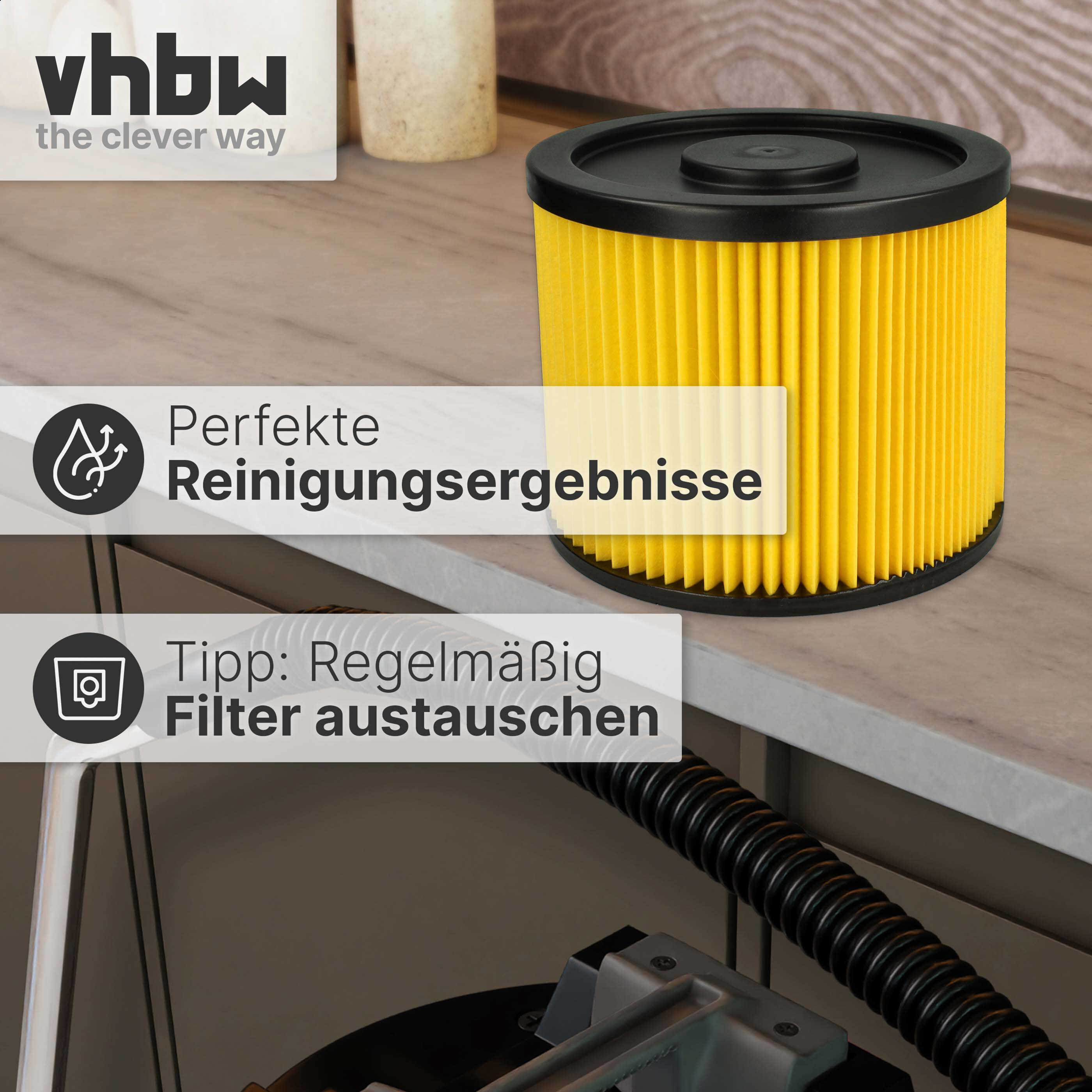 Gelber Staubsaugerfilter mit schwarzem Deckel auf Holztisch.