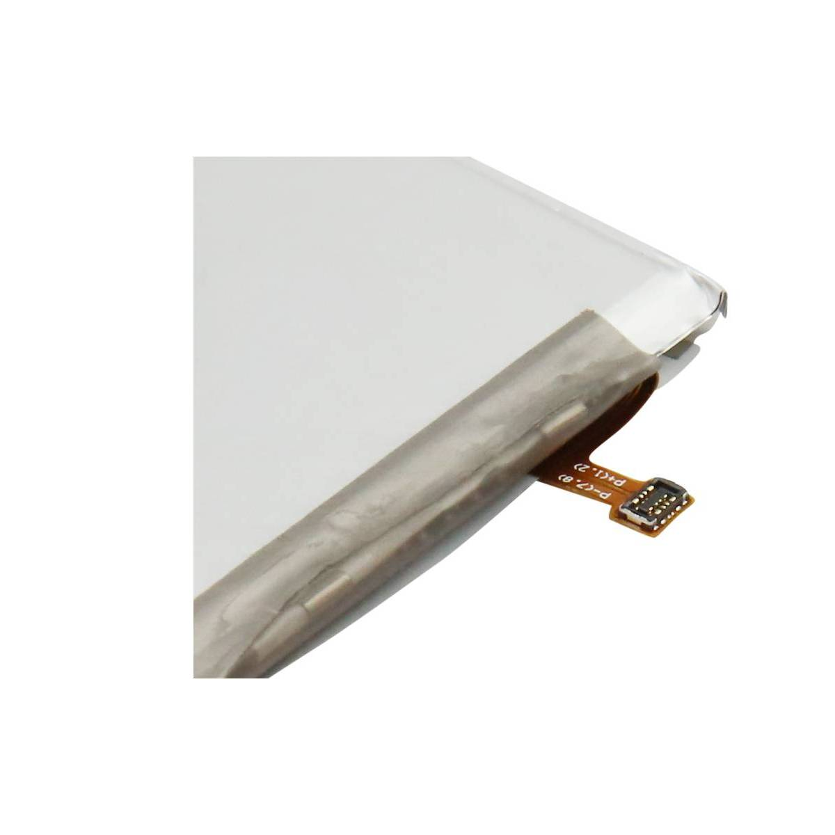 Primer plano de una batería blanca y vacía con un cable flexible plano y conector.