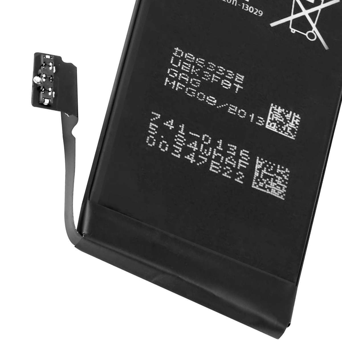 Batteria nera con cavo e connettore grigi, con testo e segni bianchi.