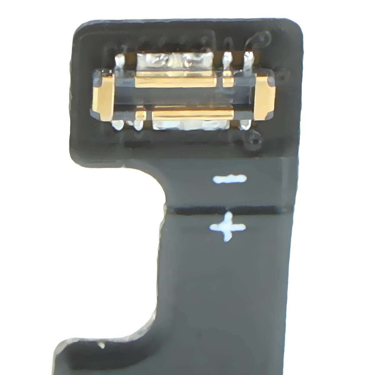Ein schwarzes Kabel mit goldenen Kontakten und Plus-/Minuszeichen.