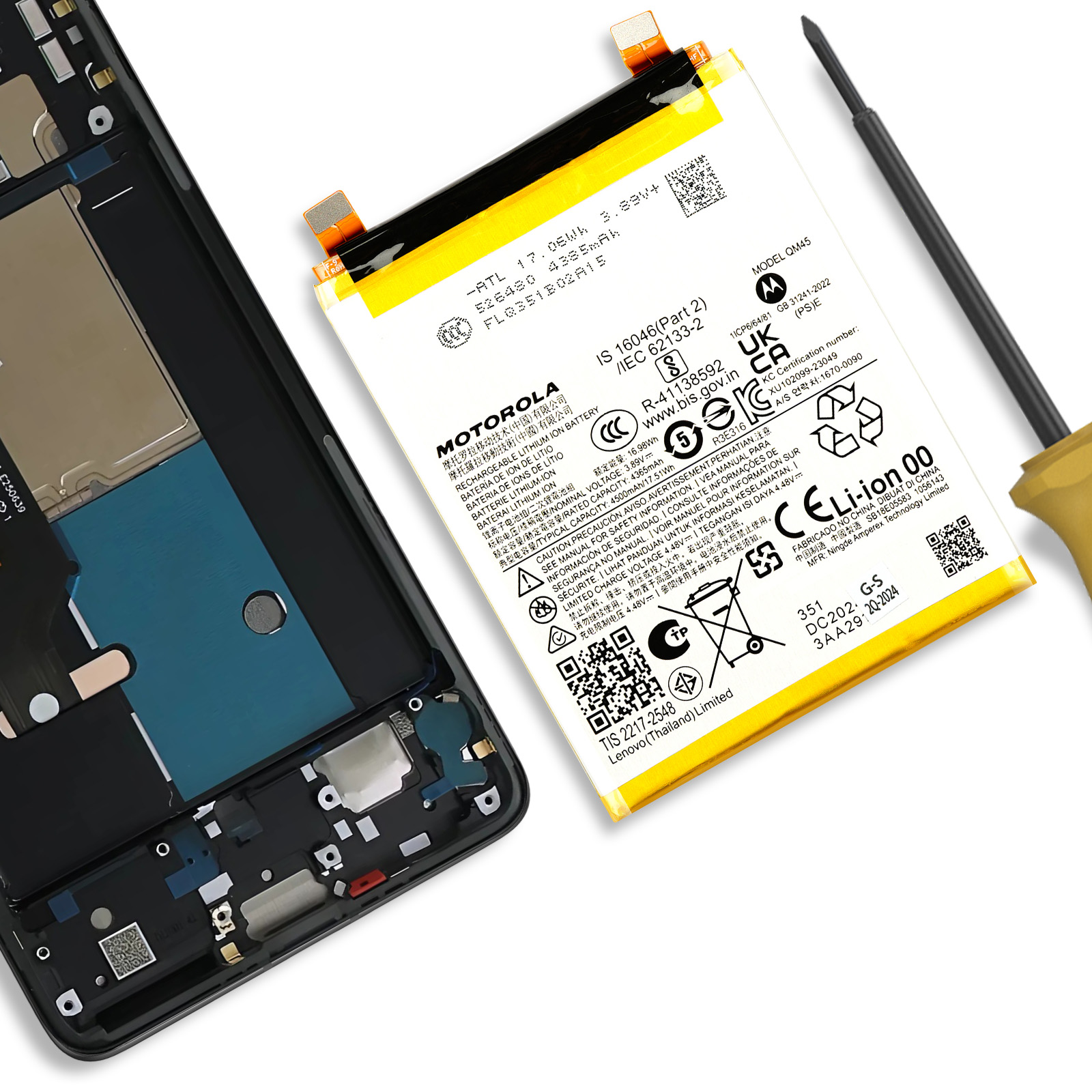 Scocca di smartphone con batteria Motorola e cacciavite accanto.