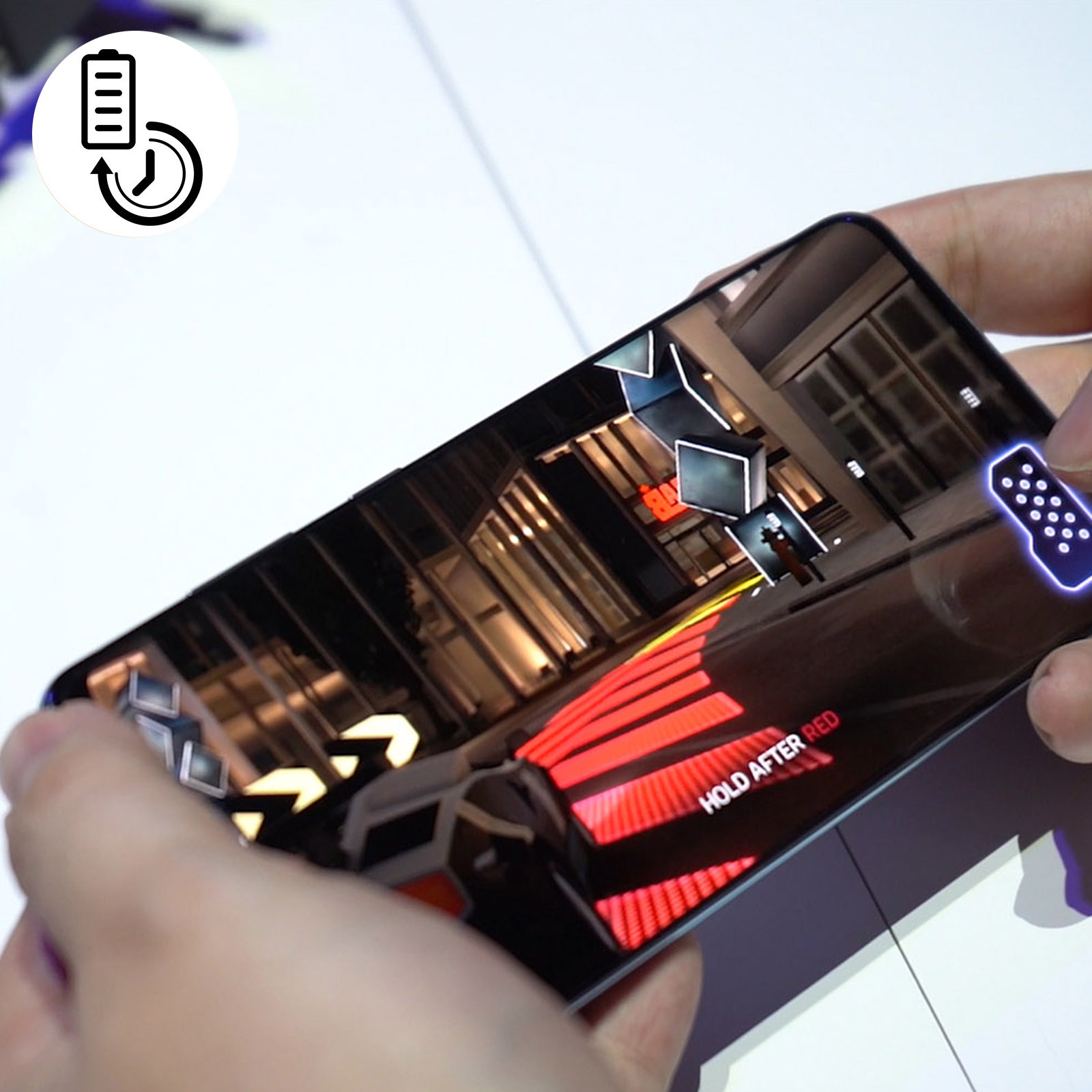 Smartphone affiche un jeu de course avec des rayures et des blocs rouges.