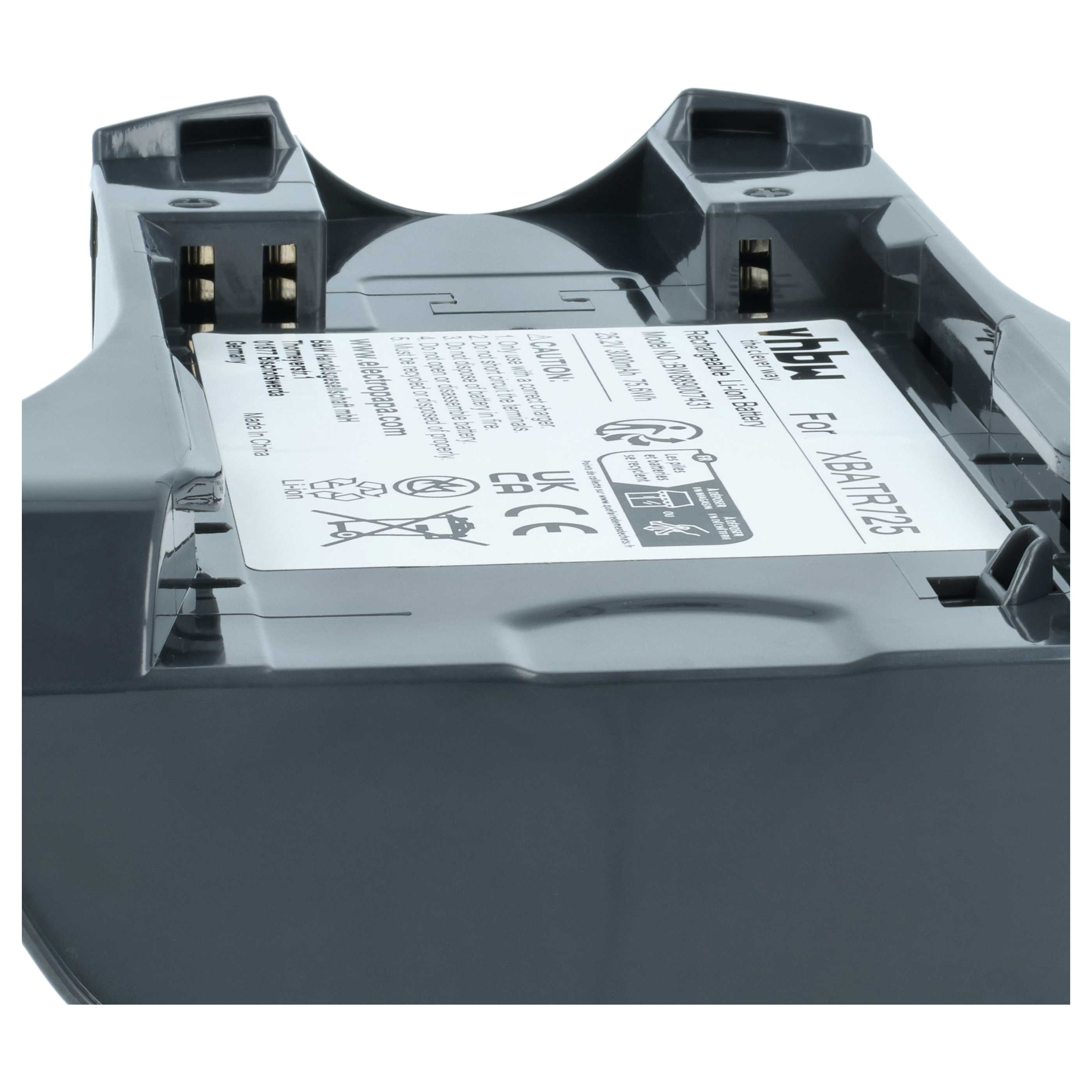 Grauer Akku für XBATR125 mit Ladekontakten und Aufkleber.