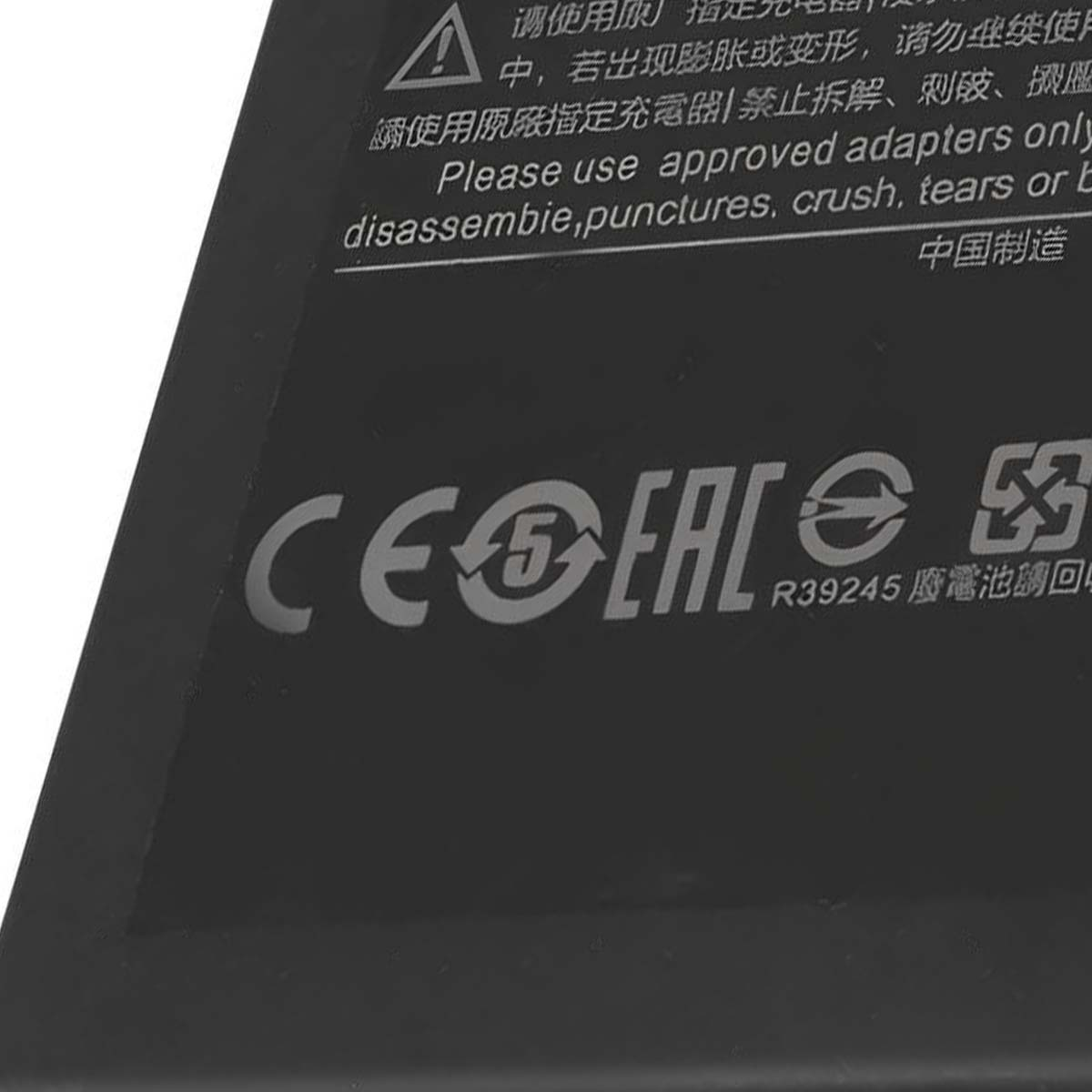 CE- und EAC-Siegel auf schwarzem Hintergrund. Warnhinweise auf Chinesisch und Englisch.
