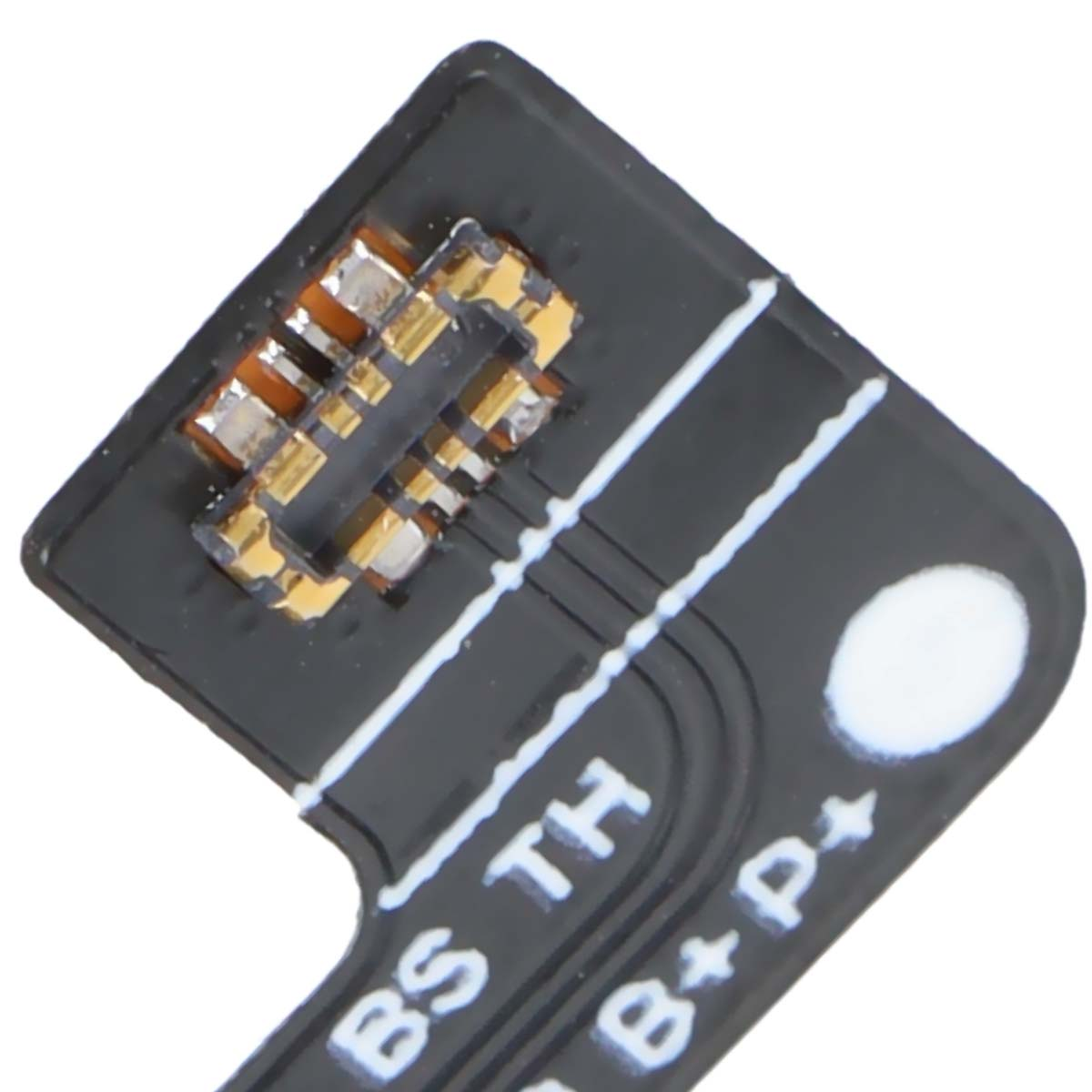 Componente di circuito stampato nero con contatti dorati e segni bianchi.