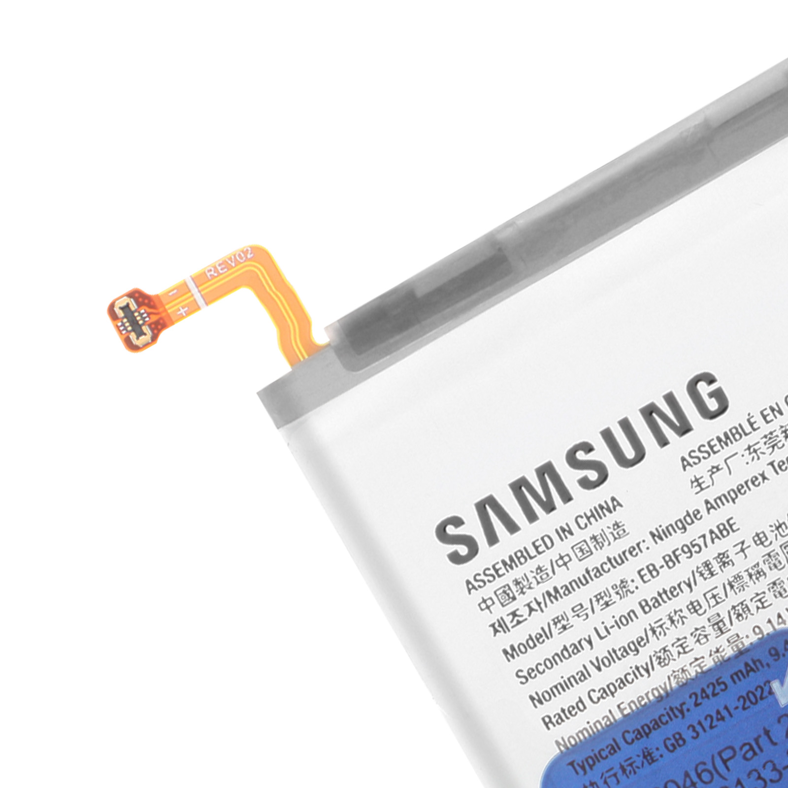 Batterie Samsung avec marquage REV02 et contacts de charge.