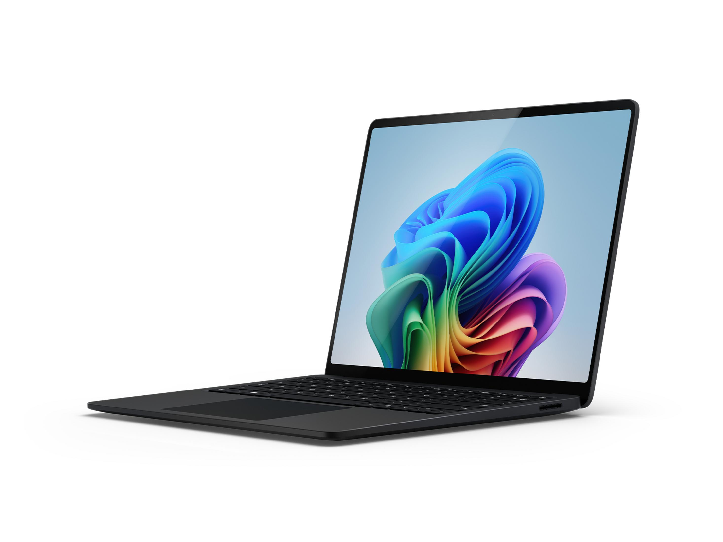 Czarny laptop z kolorowym, falistym wzorem na ekranie, na białym tle.