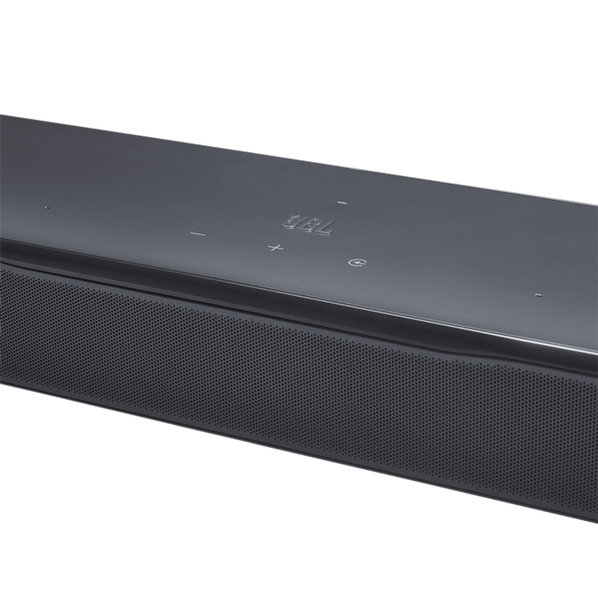 Una barra de sonido oscura con el logo de JBL y botones de control.
