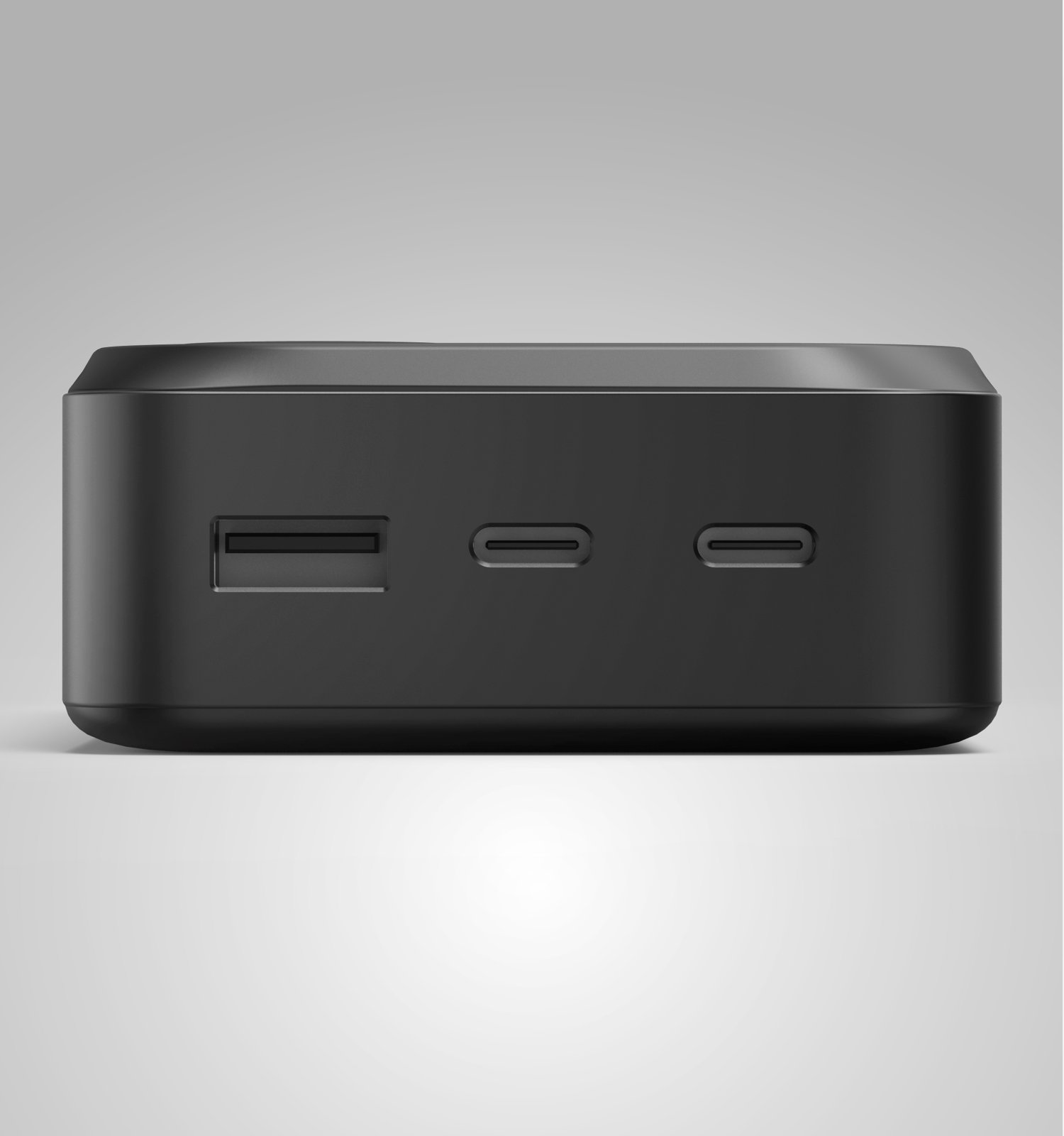 Czarno-prostokątne urządzenie z jednym portem USB-A i dwoma USB-C.