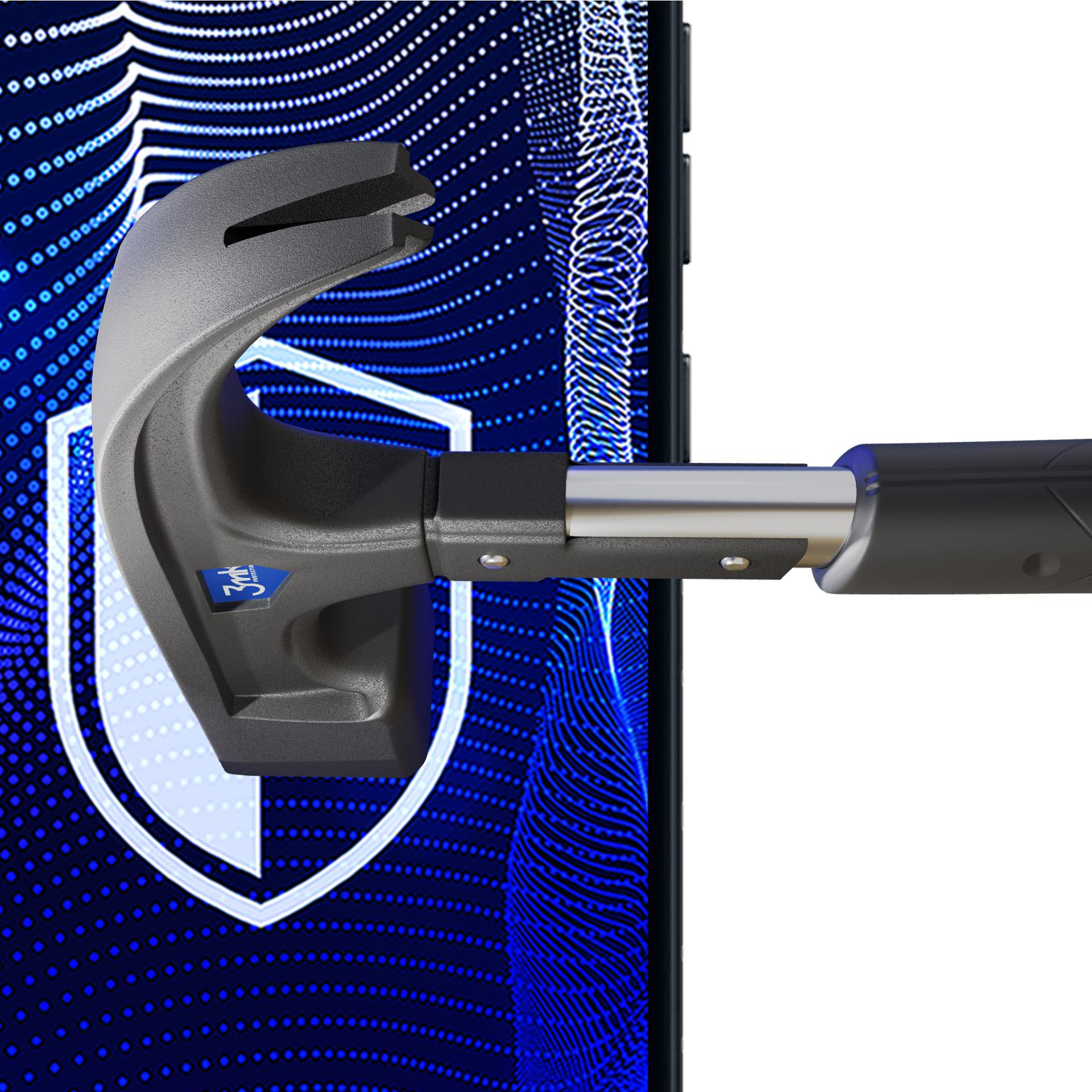 Młotek uderza w niebieską, kropkowaną tarczę z falistym wzorem.