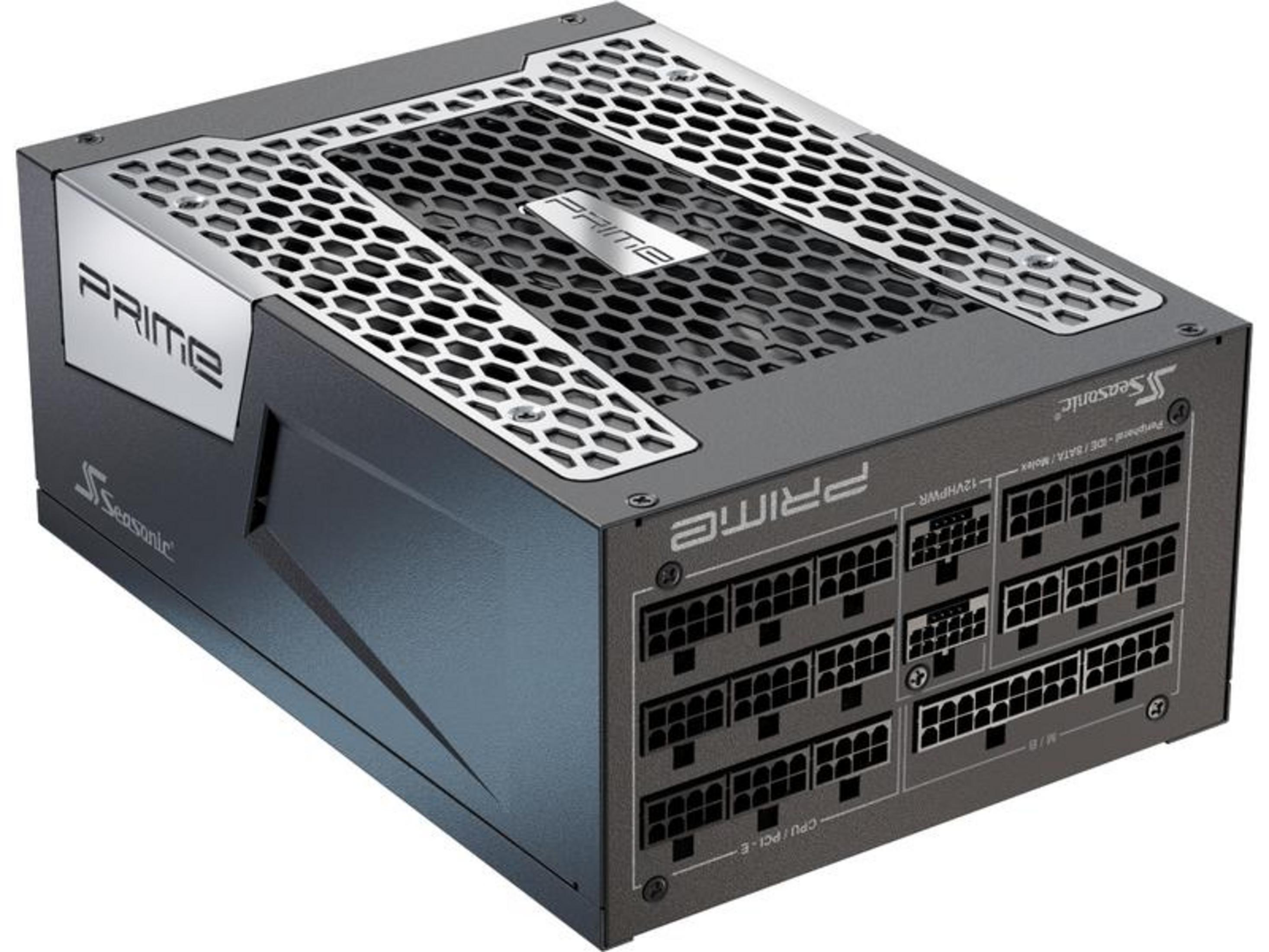Grijze voeding met zilveren "PRIME"-logo en honingraat ventilatorrooster.