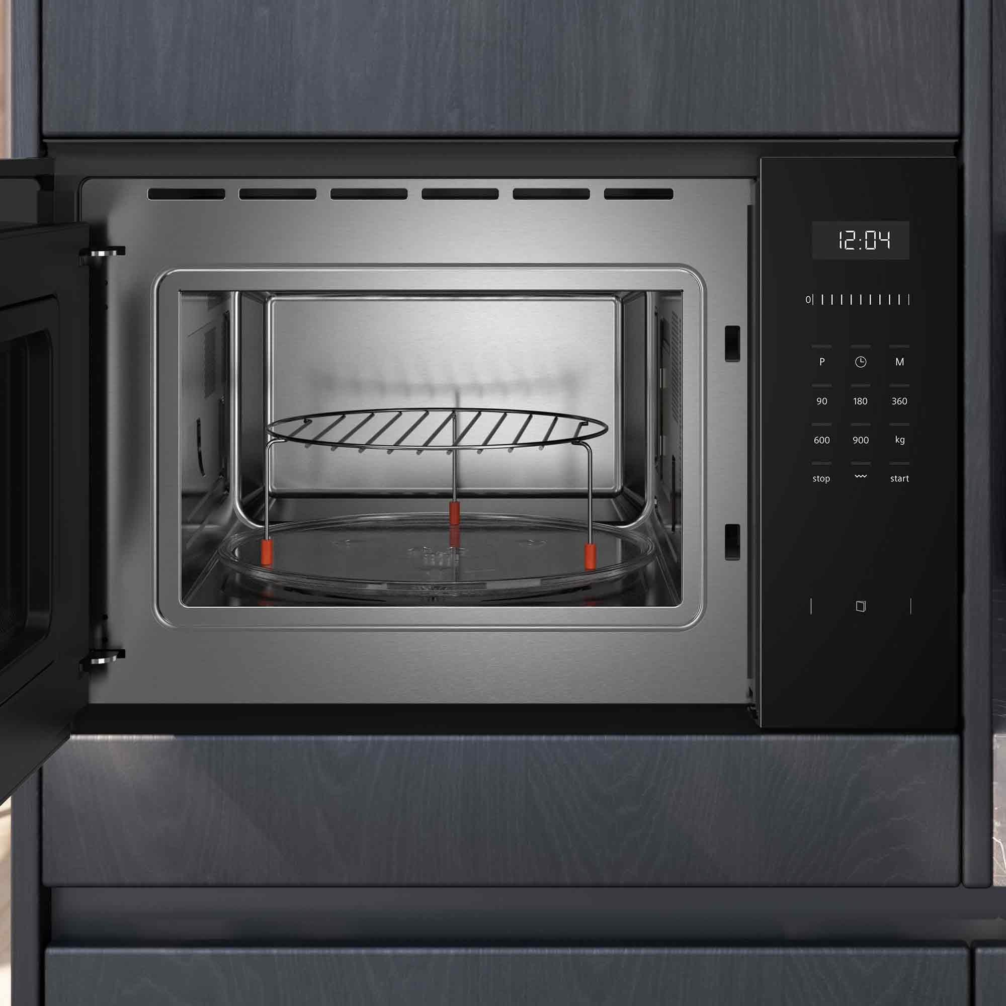 Otwarty wbudowany piekarnik mikrofalowy z rusztem i szklanym talerzem obrotowym.