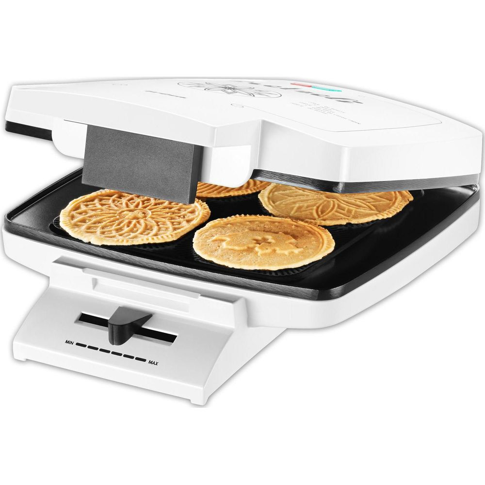 Ein weißer Waffelautomat mit vier goldenen Waffeln, zwei mit Mustern.