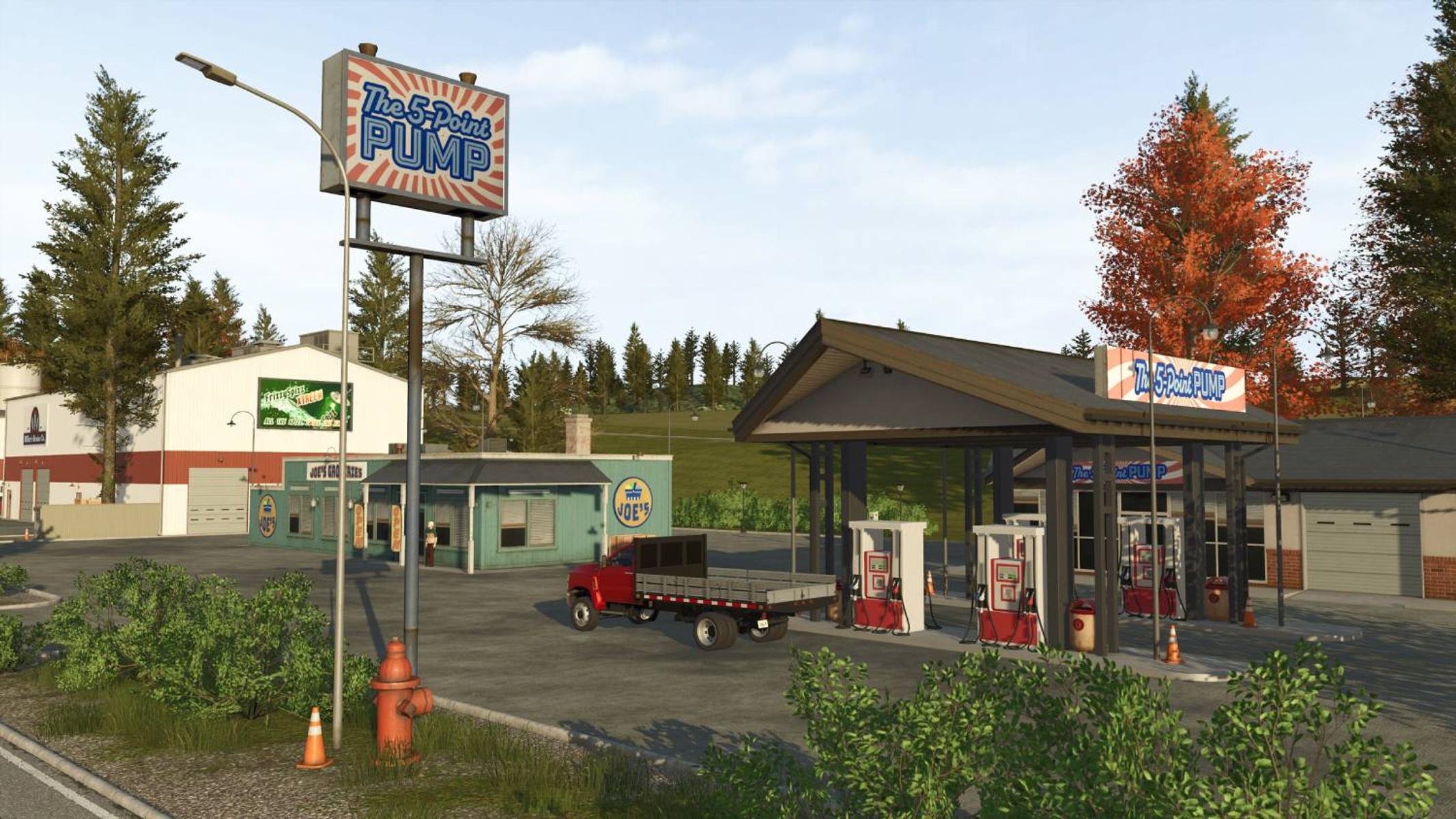 Stazione di servizio con camion rosso, insegna "The 5-Point PUMP" e alberi.