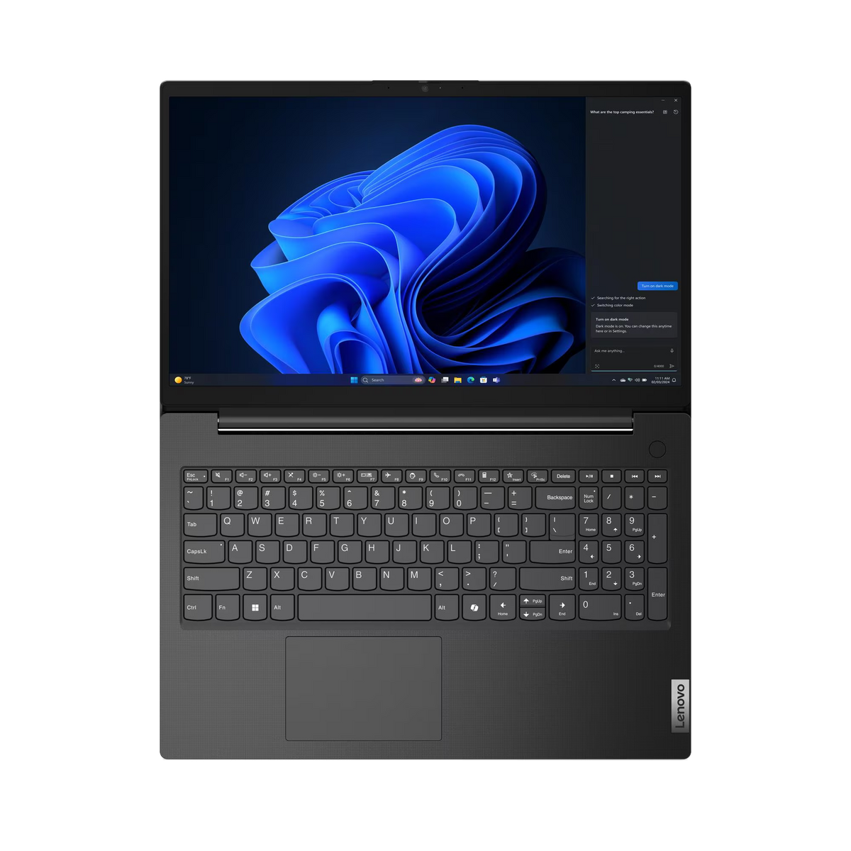 Un portátil abierto que muestra un fondo de pantalla azul y un teclado.