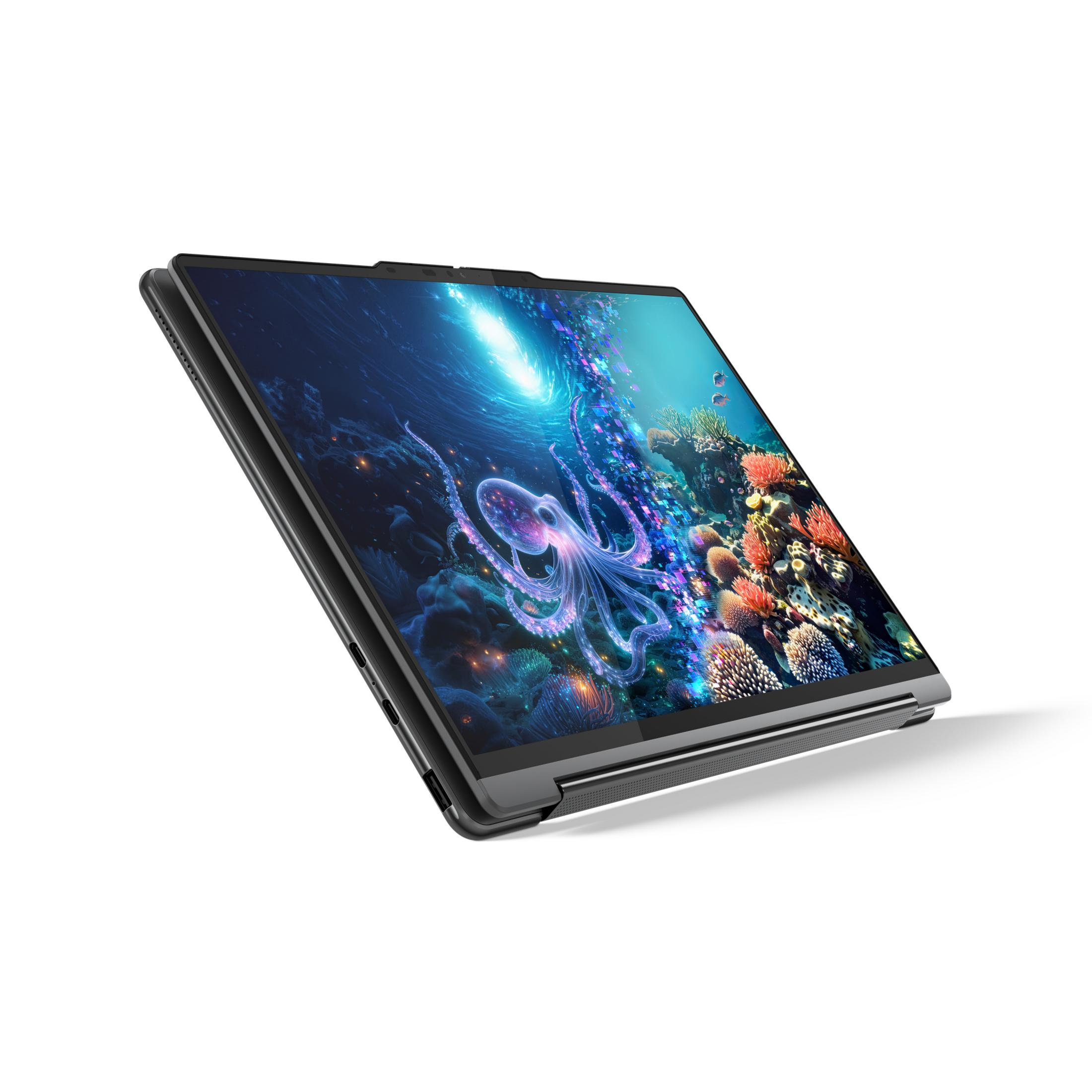 Ein Laptop zeigt ein leuchtendes Oktopus-Bild im Meeresleben-Design.