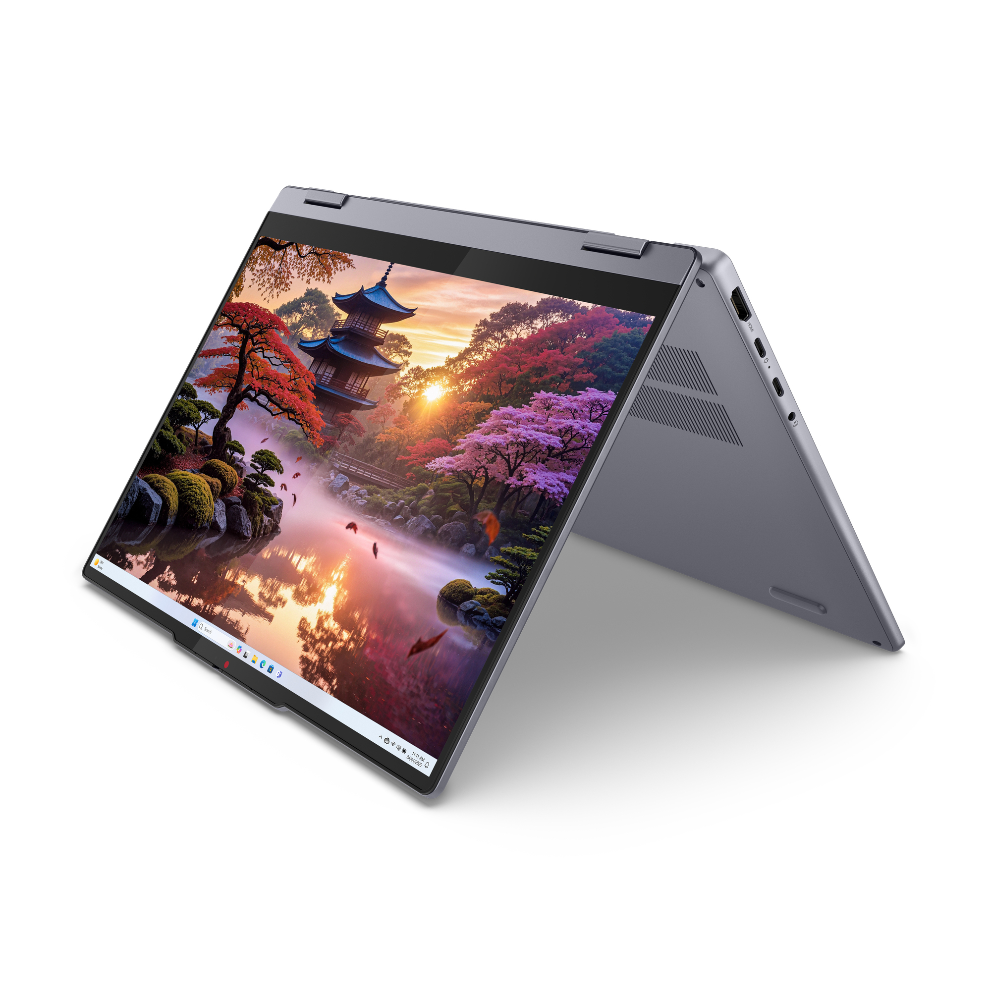 Laptop wyświetla obraz japońskiego ogrodu z pagodą, drzewami i stawem.