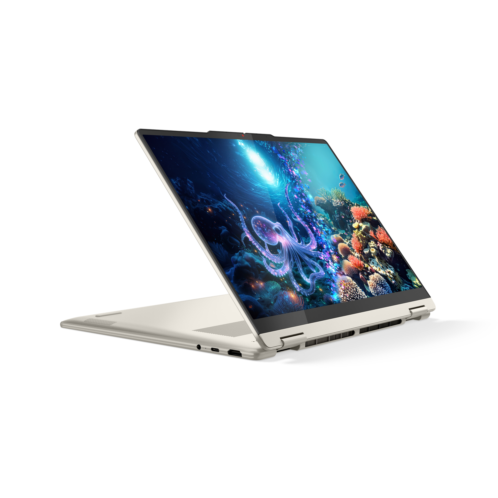 Otwarty laptop wyświetla ośmiornicę w tętniącej życiem podwodnej scenie z koralowcami.
