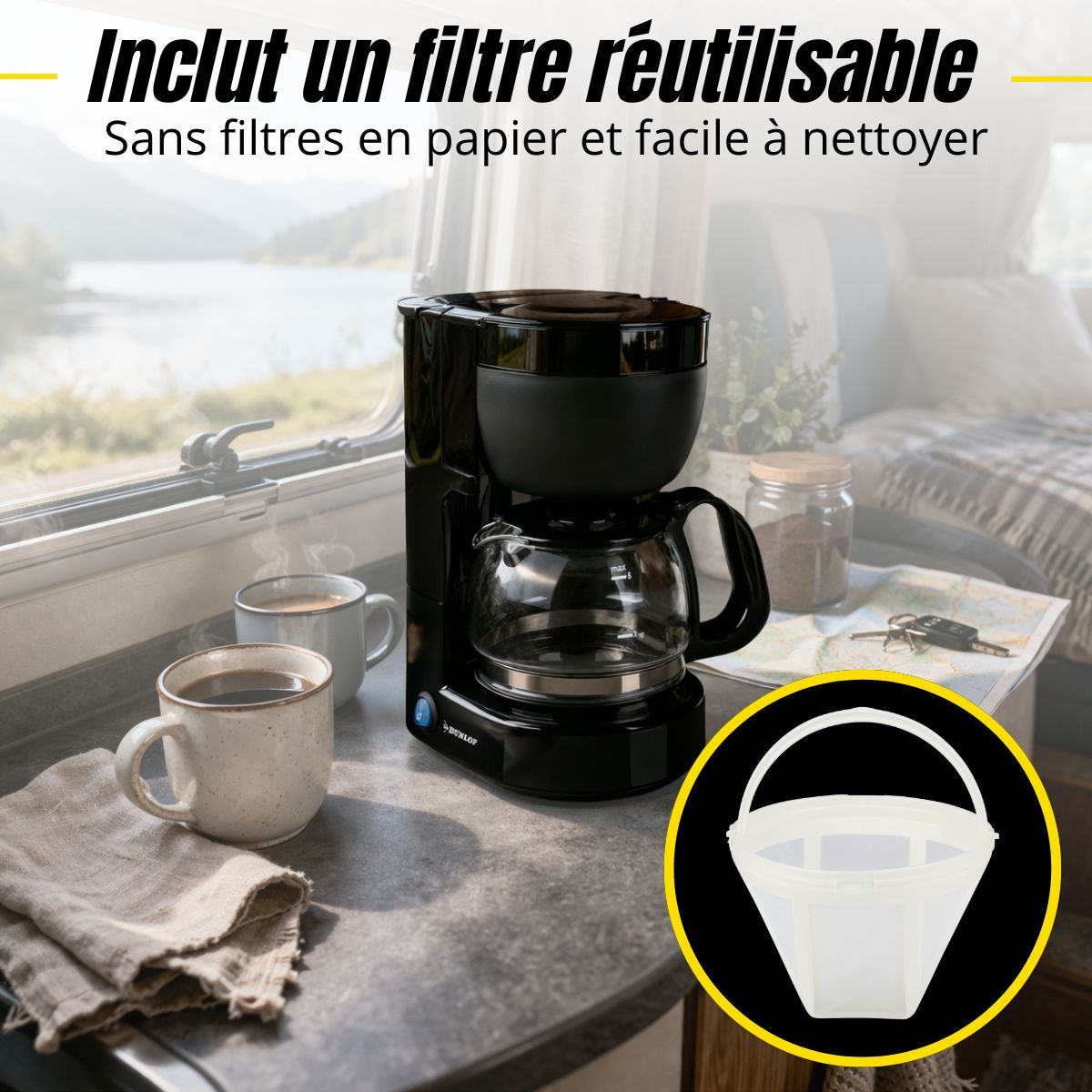Coffee maker with glass carafe, two cups, and a reusable filter.
