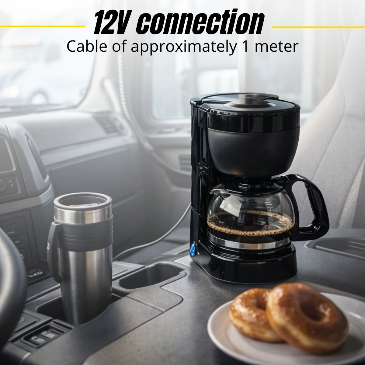 Coffee maker in a truck with coffee, mug, and donuts. 12V connection.
