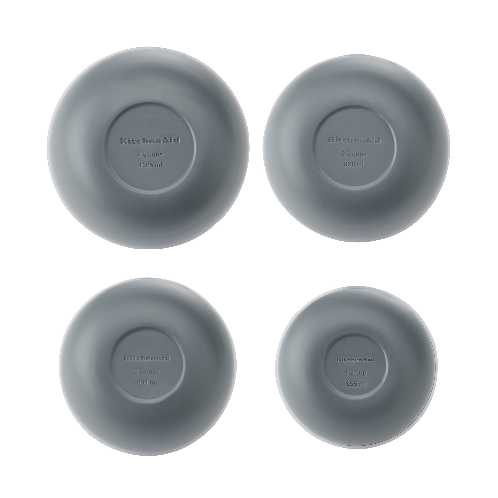 Vier graue KitchenAid-Rührschüsseln mit angegebenen Fassungsvermögen: 4,5, 3,5, 2,5, 1,5 Tassen.