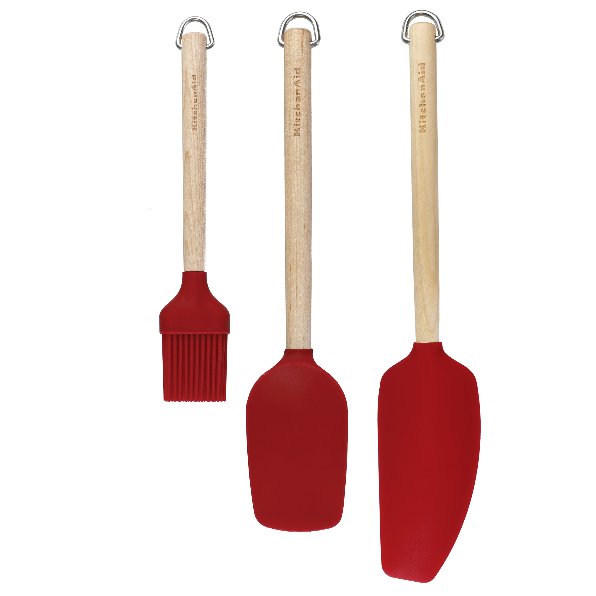 Drei rote Küchenutensilien mit Holzgriffen.