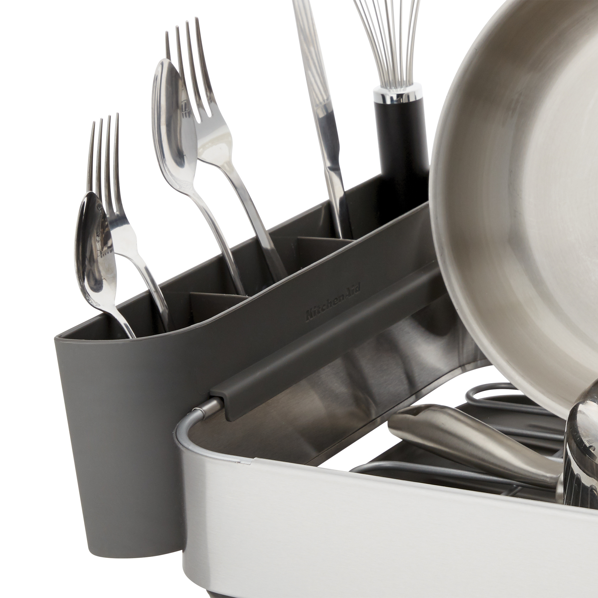 KitchenAid Geschirrgestell mit Gabeln, Löffeln, Schneebesen und Pfanne. Grau und Silber.