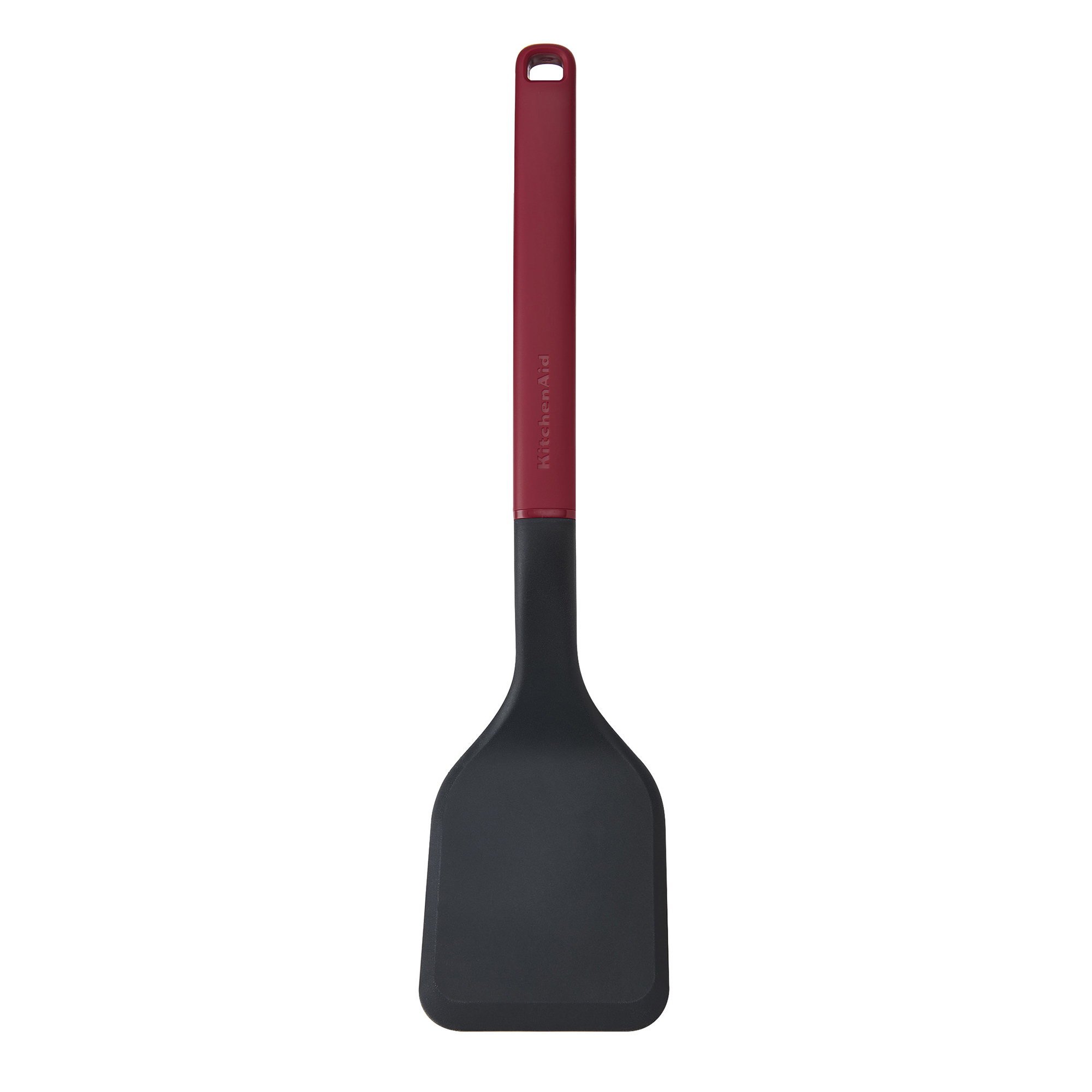 Ein rot-schwarzer Küchenwender mit KitchenAid-Logo auf dem roten Griff.