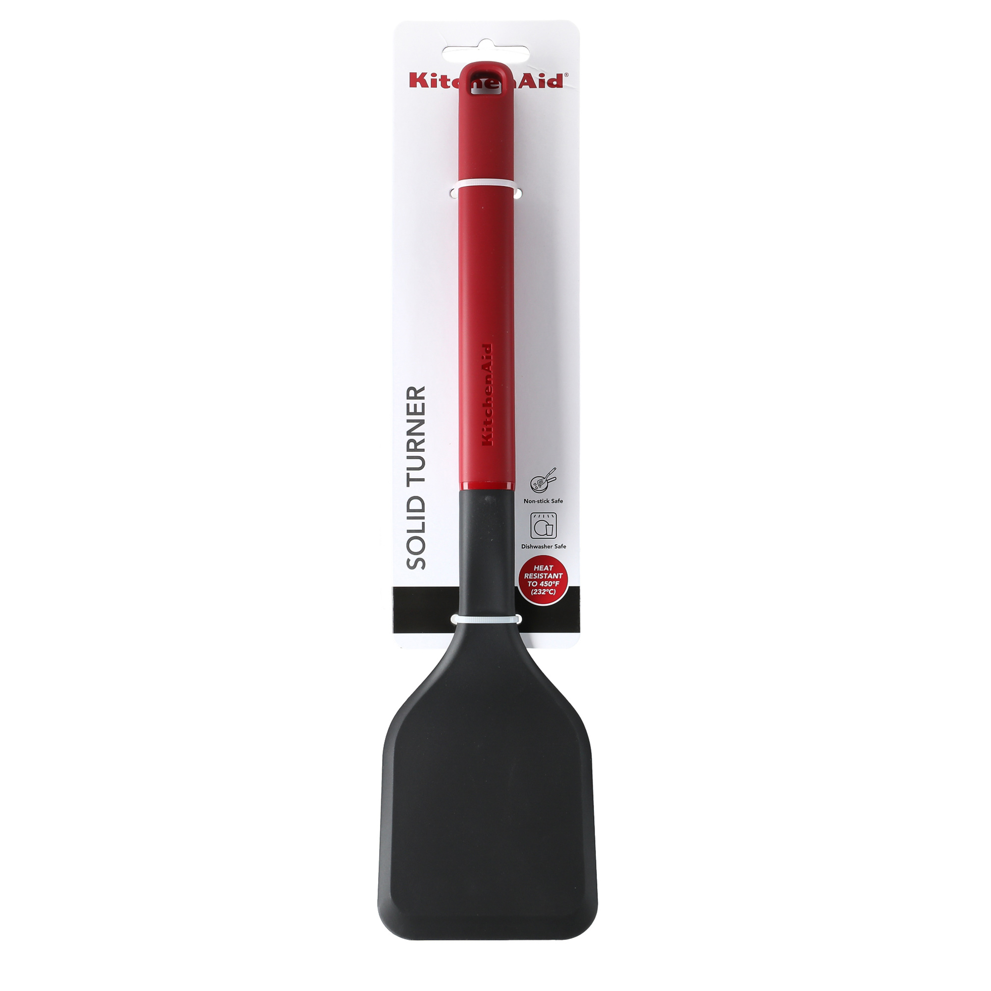 Ein schwarzer Pfannenwender mit rotem Griff von KitchenAid, verpackt.