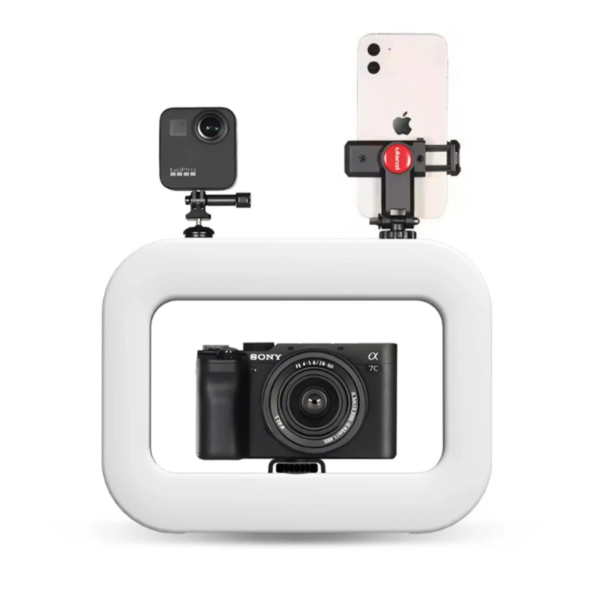 Ein Sony-Kamera ist in einem weißen Ring, daneben eine GoPro und ein iPhone.
