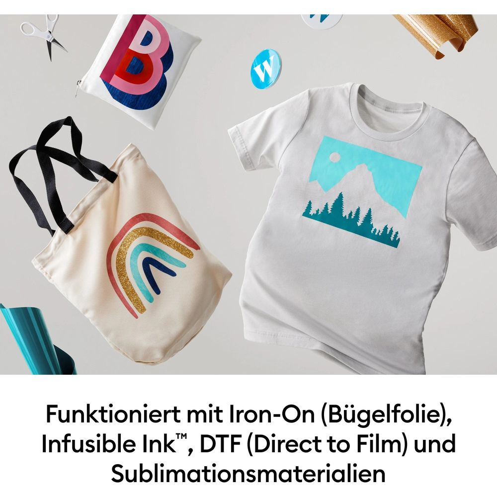 Camiseta y bolso blanco con diseños coloridos, tijeras y vinilo.