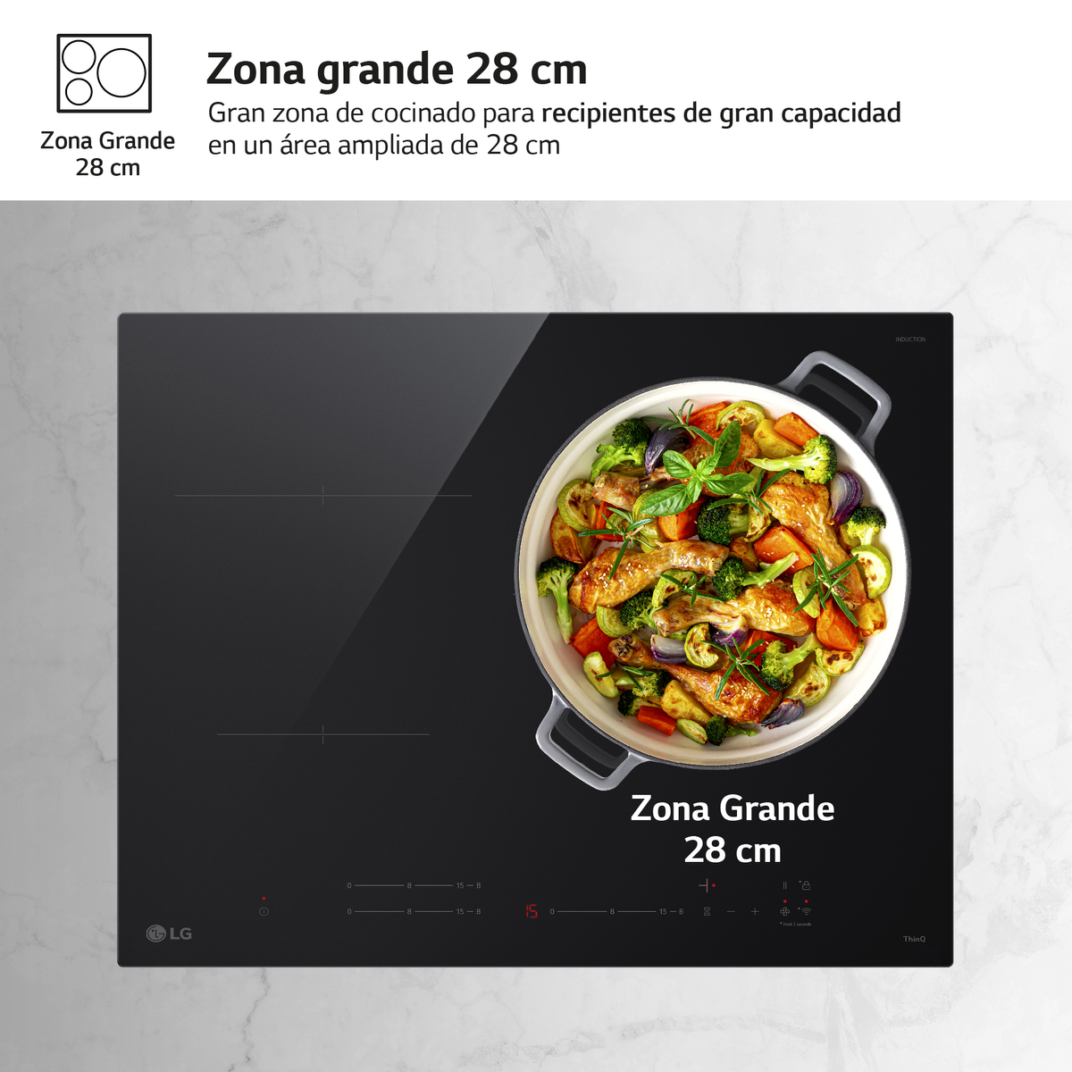 Placa de inducción con zona de cocción grande de 28 cm y un plato de pollo y verduras.