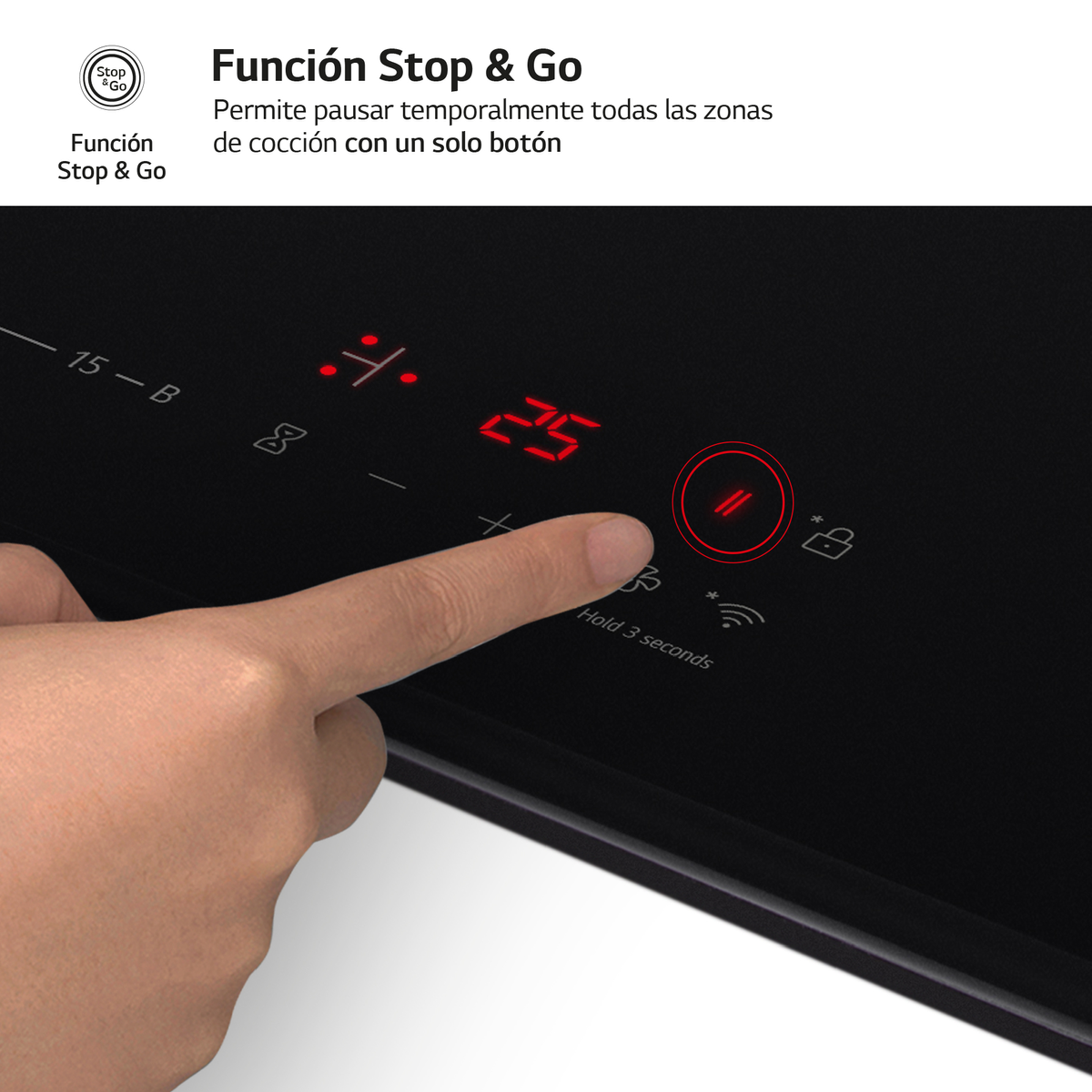 Un dedo toca el panel de control de una placa de inducción para activar la función Stop & Go.