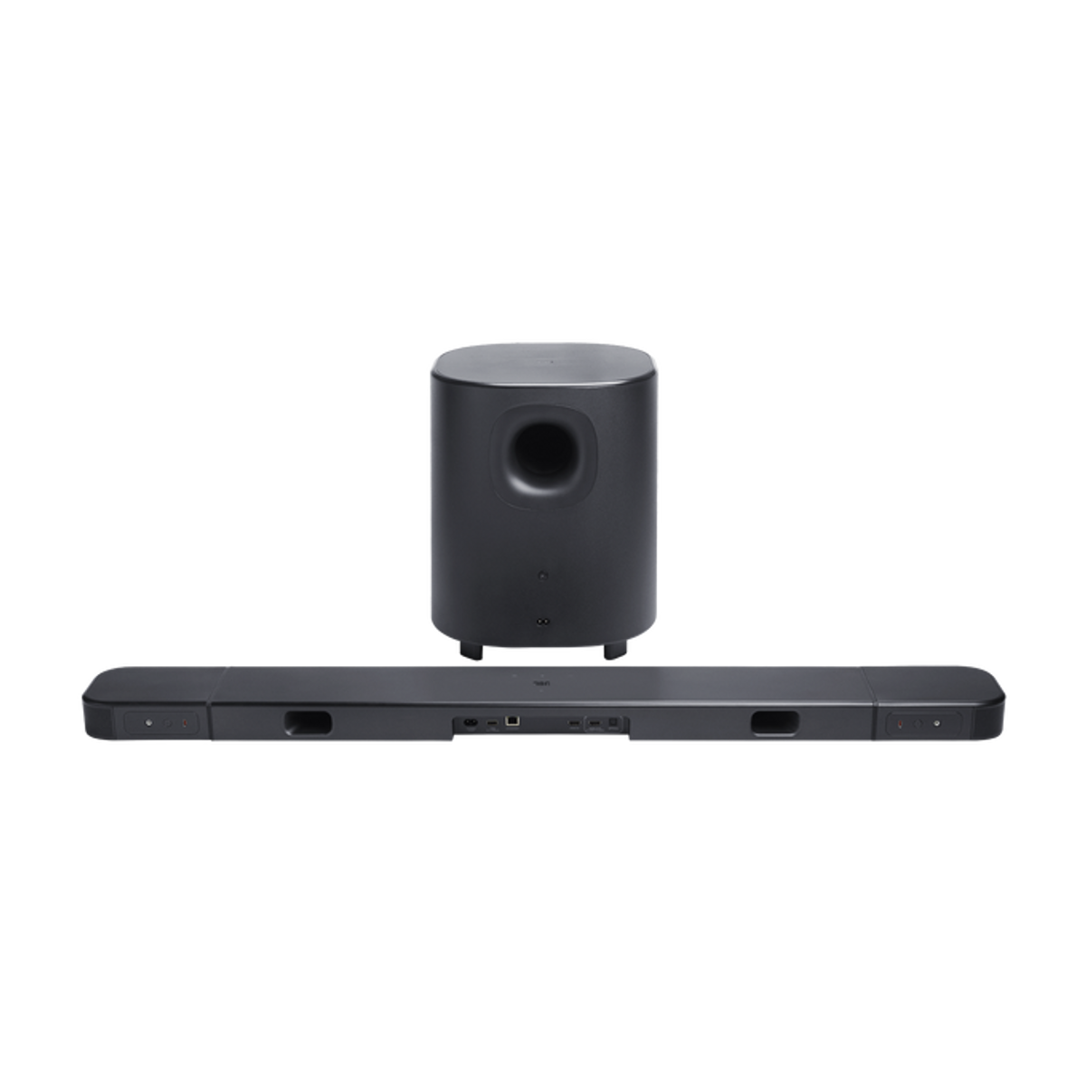 Un subwoofer cilíndrico gris oscuro se asienta detrás de una barra de sonido gris oscuro con puertos.