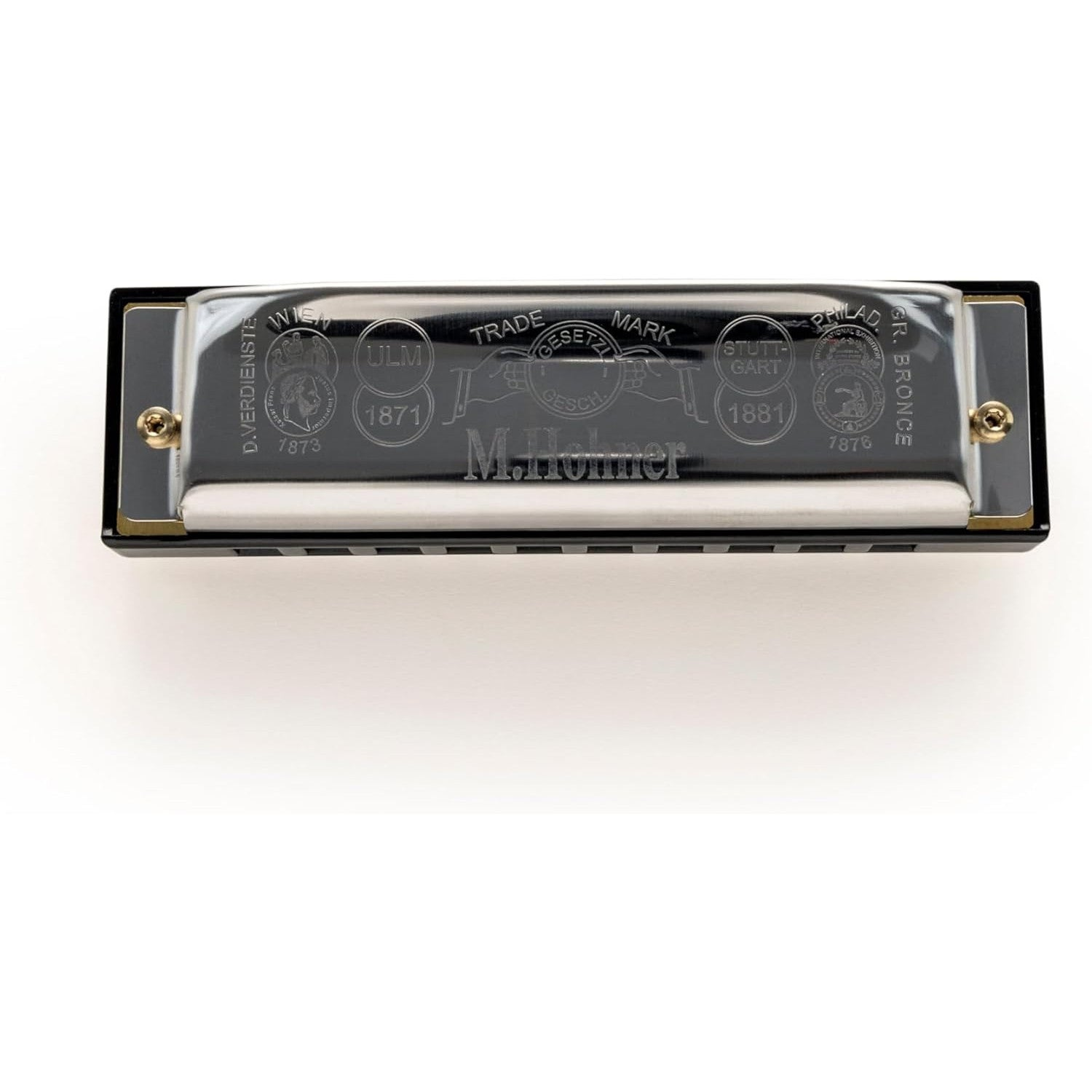 M. Hohner mondharmonica met zilveren metalen deksel, zwarte kam en gegraveerde details.