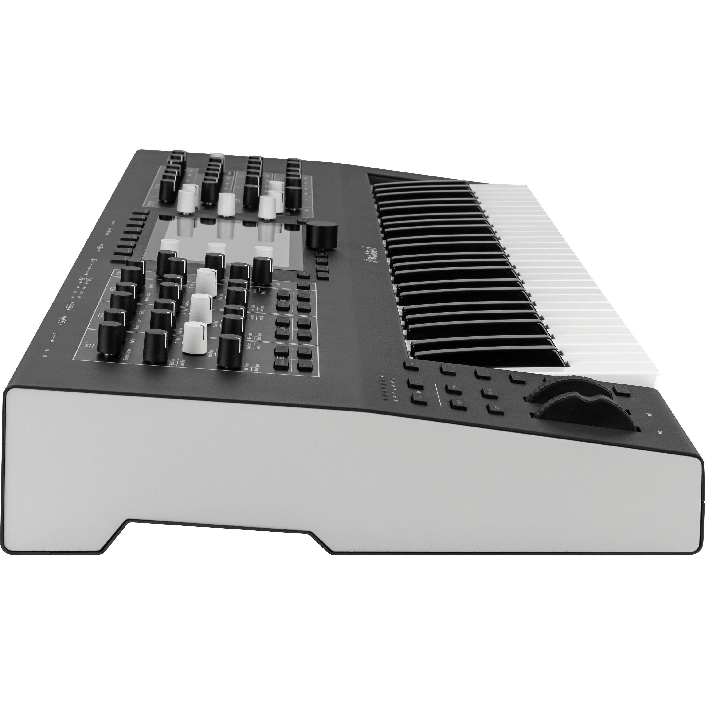 A black and white keyboard with numerous knobs and controls.