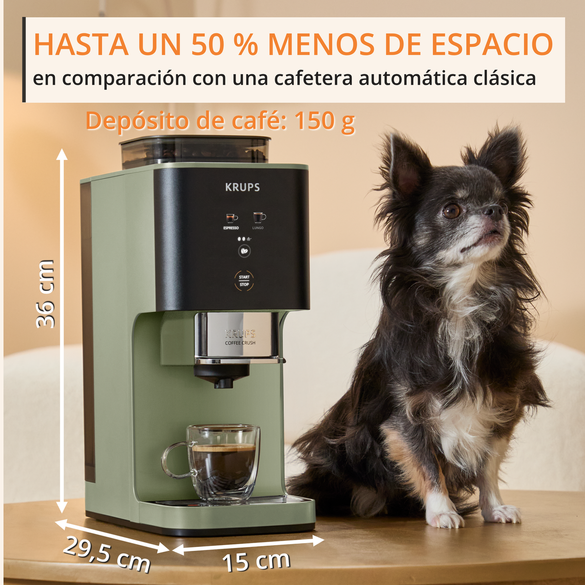 Una macchina da caffè Krups verde con un bicchiere di espresso e un cane accanto.