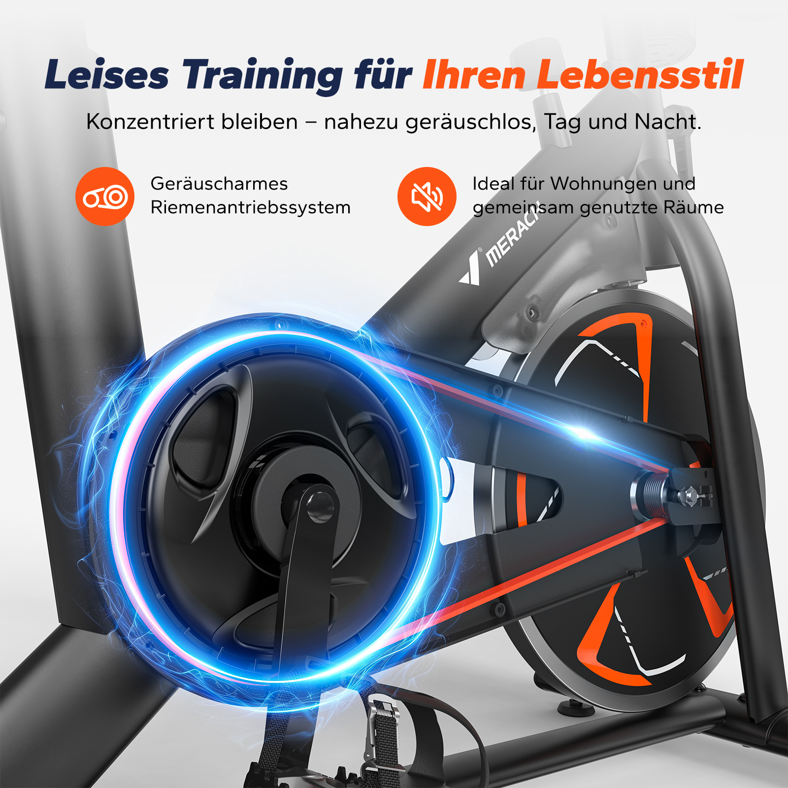 Ein schwarzes Trainingsrad mit orangen Akzenten und blauer Energie-Visualisierung.