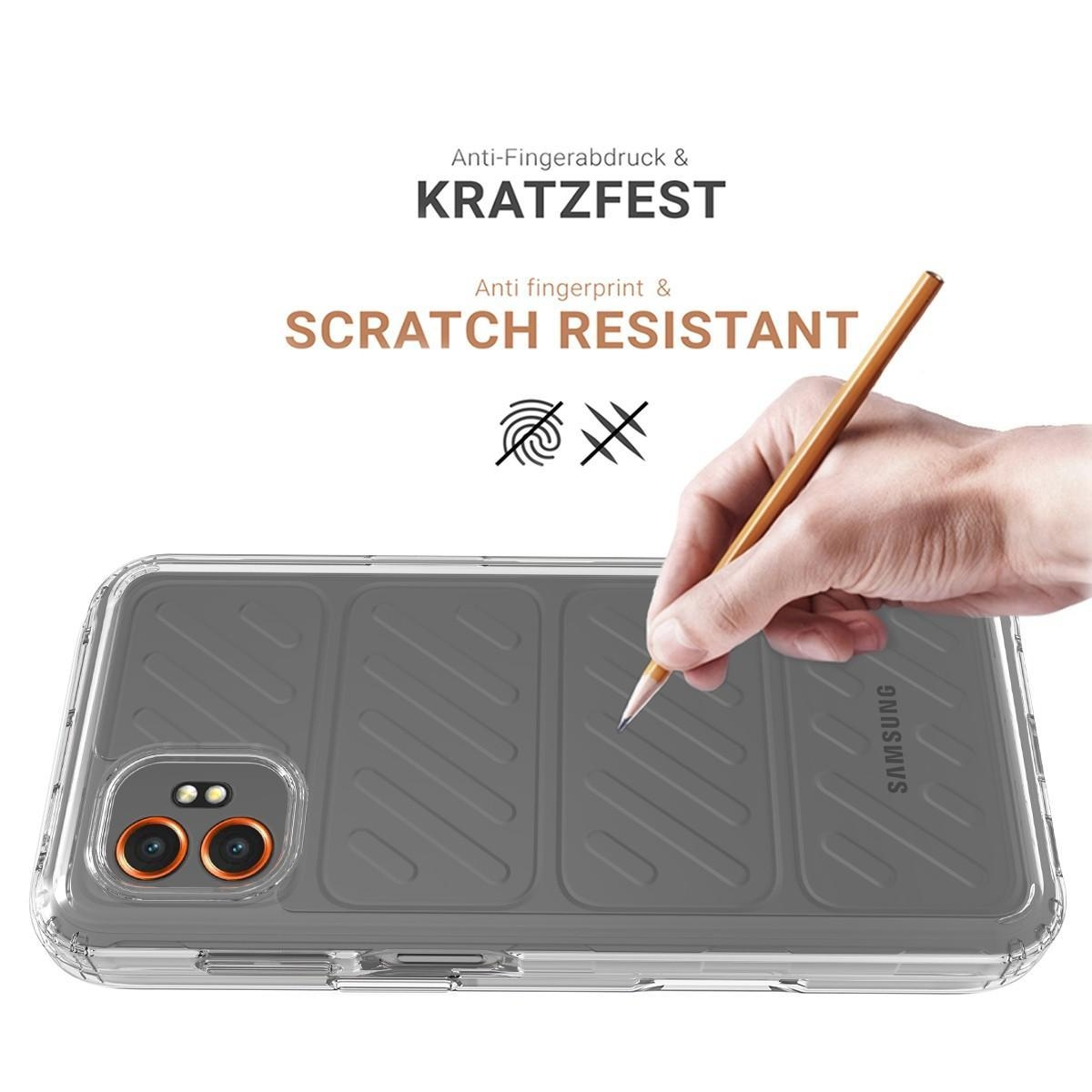 Ein Stift kratzt über eine transparente Handyhülle, die eine Rückseite mit Samsung-Logo zeigt.