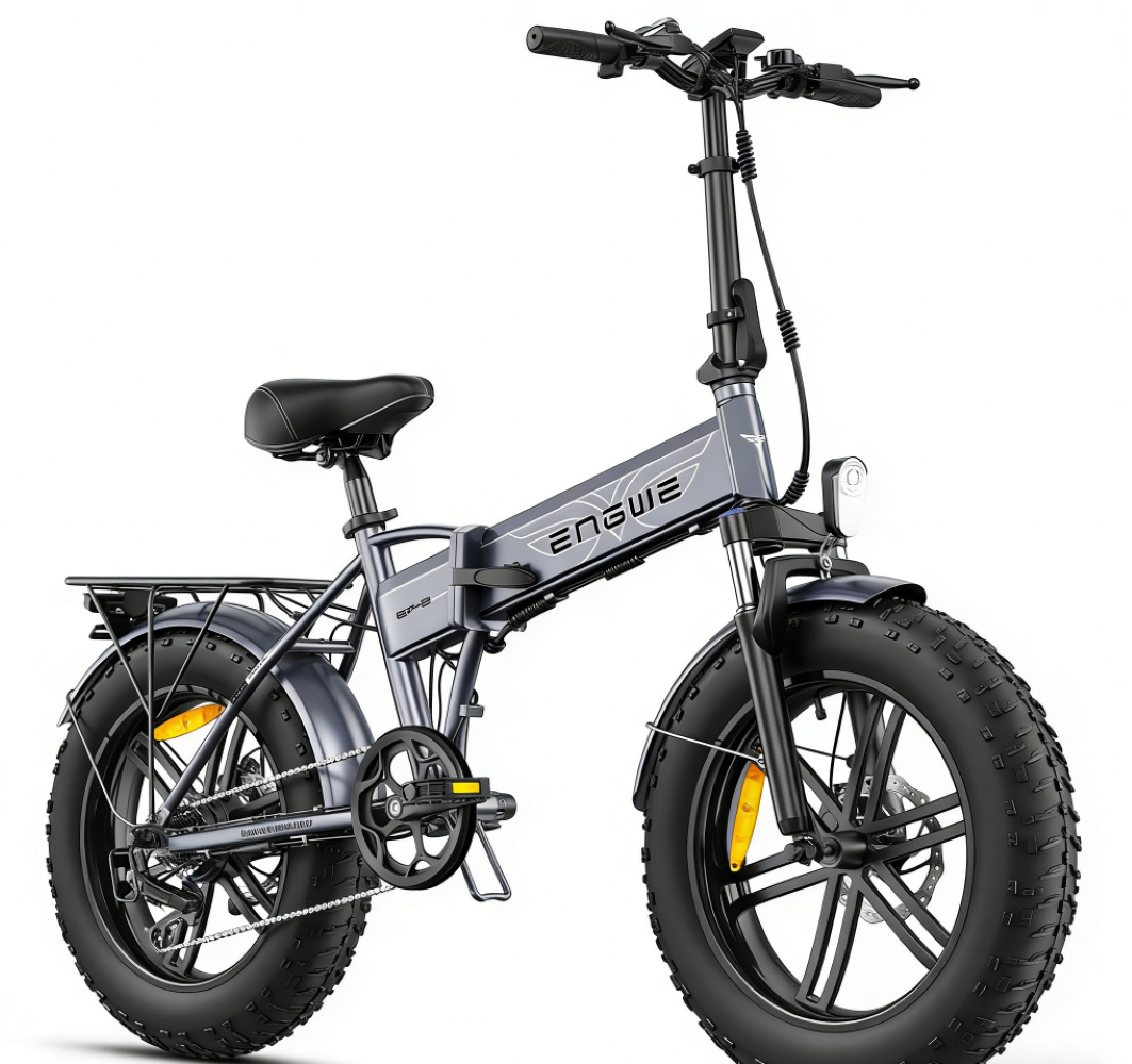 Graues faltbares E-Bike mit breiten Reifen und Gepäckträger.