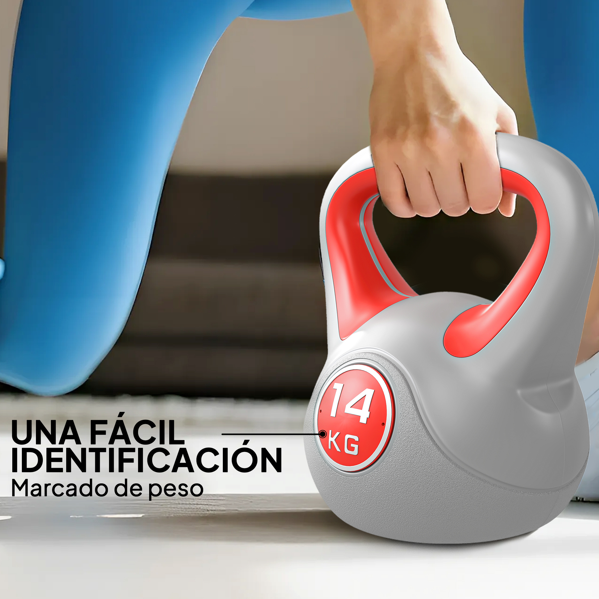 Mancuerna rusa gris de 14kg sujeta por una mano.
