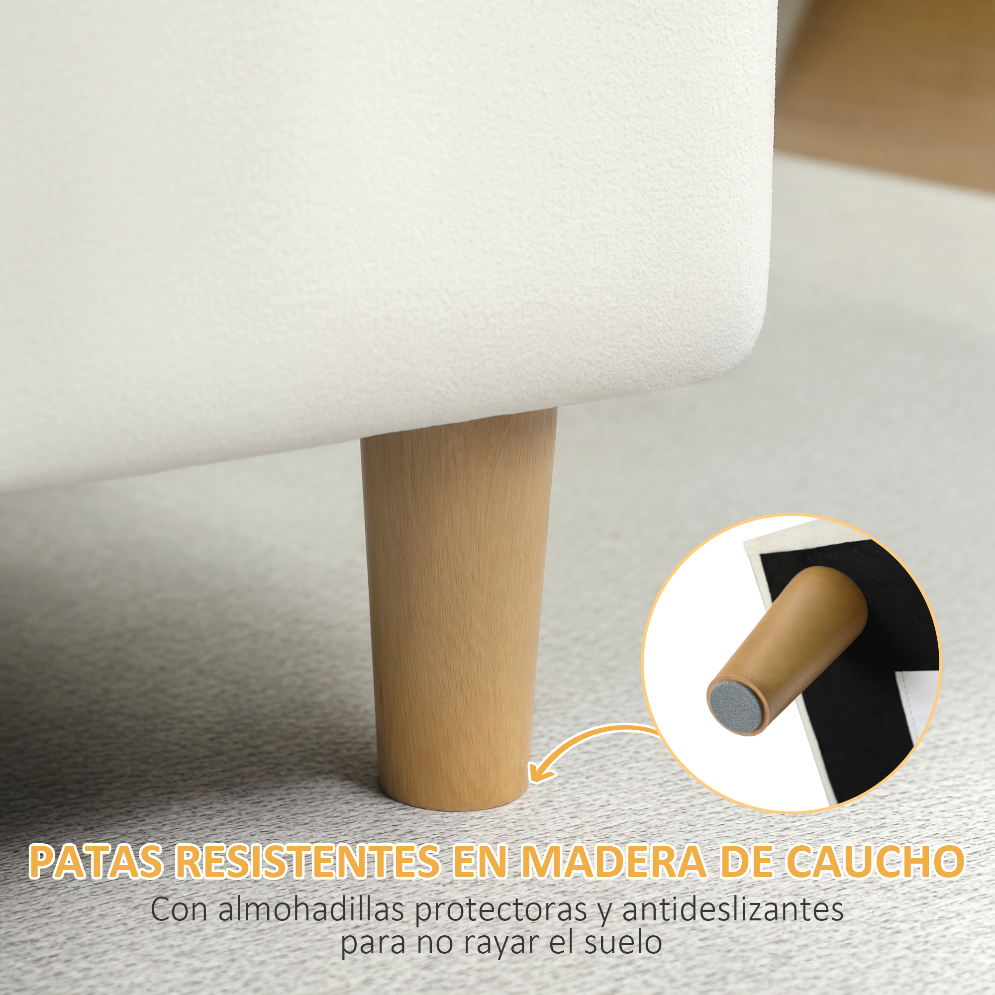 Patas blancas de sofá de madera con protectores de fieltro sobre alfombra.